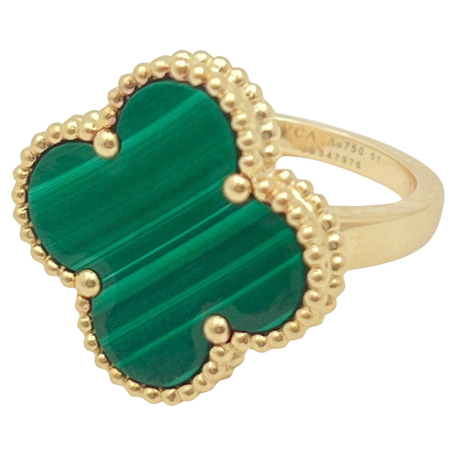Van Cleef & Arpels Magic Alhambra ring in 18k yellow gold, featuring a single clover motif of polished malachite mounted in a beaded gold frame.  Finger size 5.5 (European - size 51).  Signed 