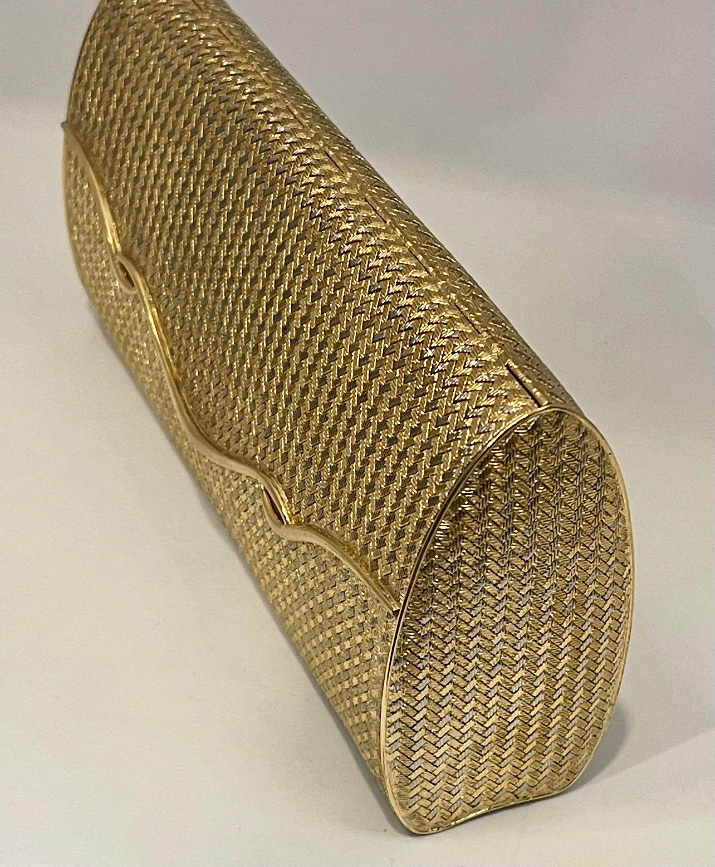 STUNNING AND RARE! 
This exquisite Vintage Clutch Purse from the 1960s was designed with a soft textured woven style,  Van Cleef and Arpels  crafted in solid  18K White and yellow gold .
Meticulously crafted 18 karat yellow gold mesh clutch. A