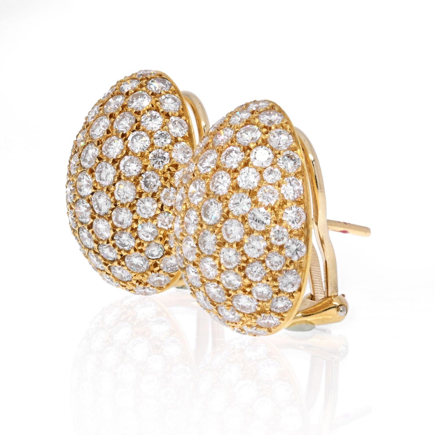 A pair of cluster pave set diamond earrings by Van Cleef & Arpels. Each oval cluster set throughout with brilliant-cut diamonds, omega with posts fittings, signed Van Cleef & Arpels NY, numbered.

Diamond Carat Weight: 5.50cttw (approx.)
Diamodn