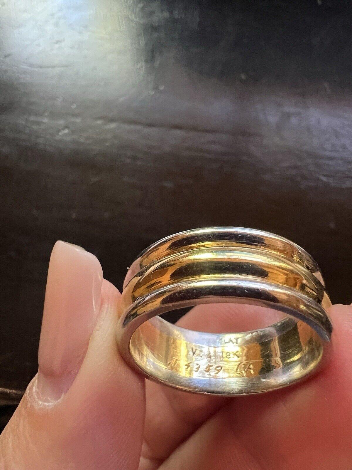 Van Cleef & Arpels 18k Yellow Gold & Platinum Band Ring Vintage Circa 1970s

Here is your chance to purchase a beautiful and highly collectible designer ring.  Truly a great piece at a great price! 

Details:

Van Cleef & Arpels VCA 18K Yellow Gold