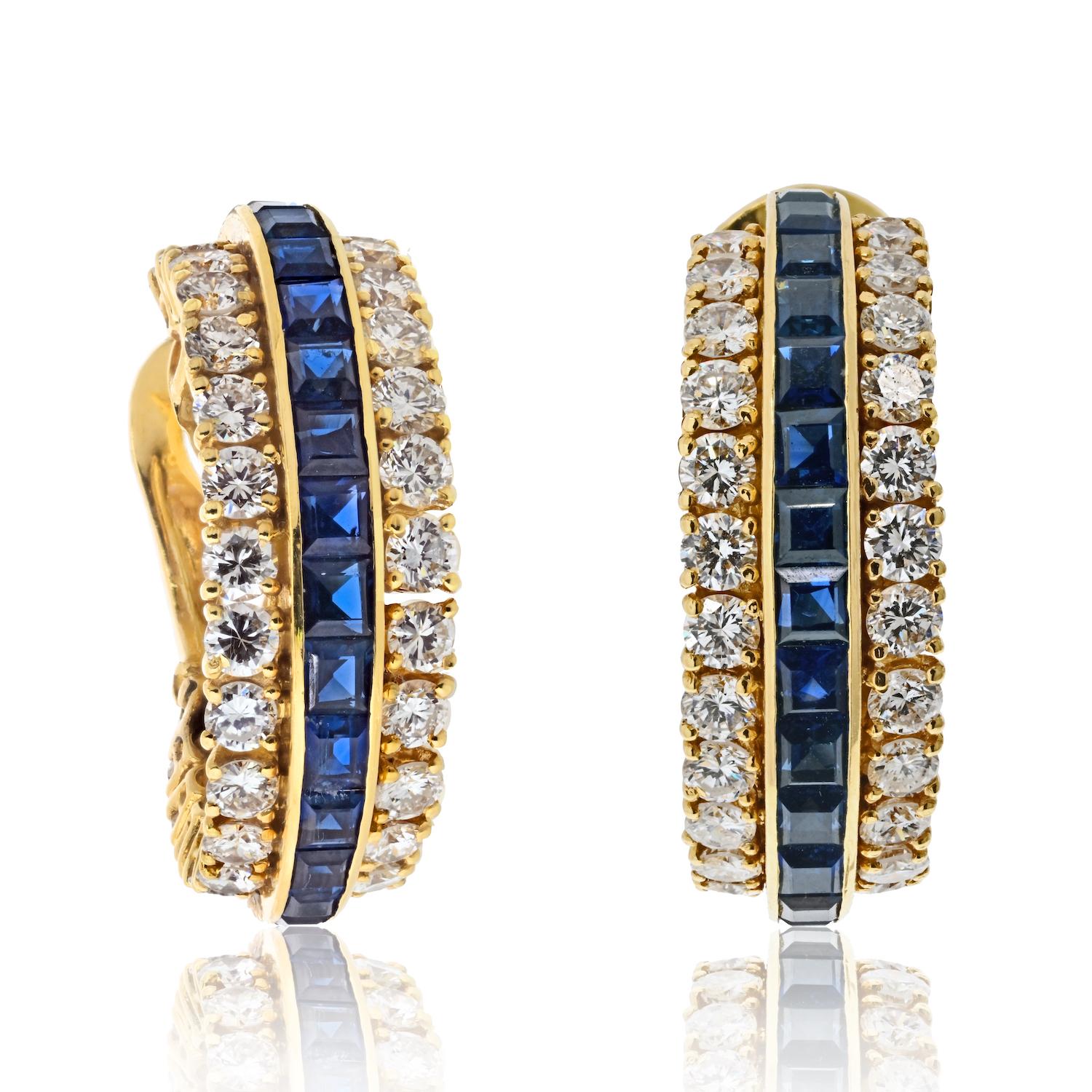 Van Cleef & Arpels 18K Yellow Gold Sapphire And Diamond Hoop Earrings.
Designed as hoop earrings these beautiful earrings feature a perfect combination of white, yellow and blue. Yellow gold serves as a great backdrop to blue sapphires and diamonds
