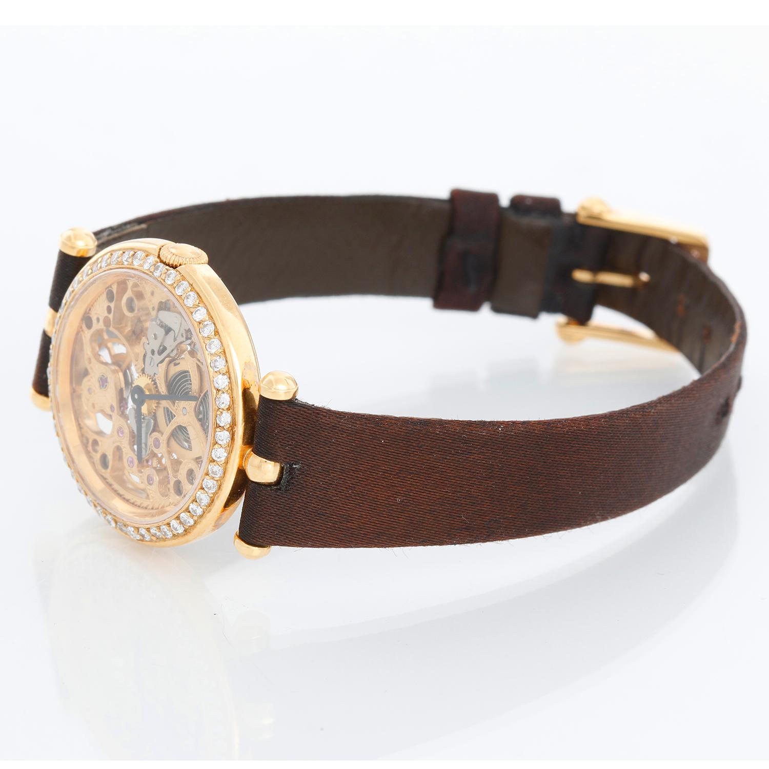 Van Cleef & Arpels 18k Gelbgold Skelett  Siehe  - Automatischer Aufzug. skelettiertes Gehäuse aus 18 Karat Gelbgold mit diamantbesetzter Lünette (27 mm Durchmesser). Skelettiertes Zifferblatt . Armband mit diamantbesetzter Goldschließe. Pre-owned