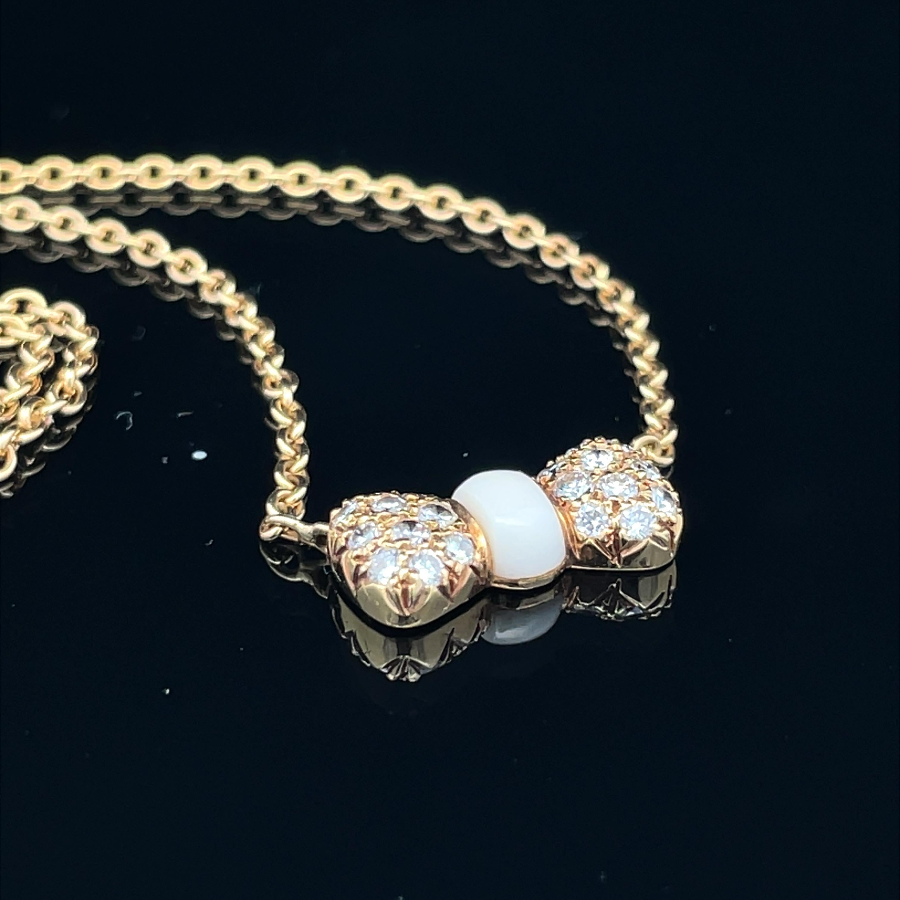 Van Cleef & Arpels 18k Yellow Gold White Coral & Diamond Bow Pendant Necklace For Sale 4
