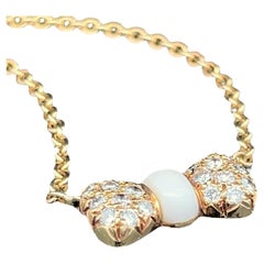 Van Cleef & Arpels 18k Yellow Gold White Coral & Diamond Bow Pendant Necklace