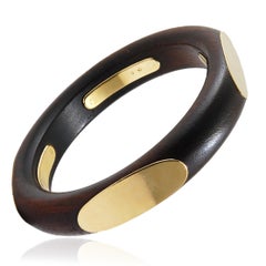 Bracelet rigide Van Cleef & Arpels en or jaune 18 carats et bois