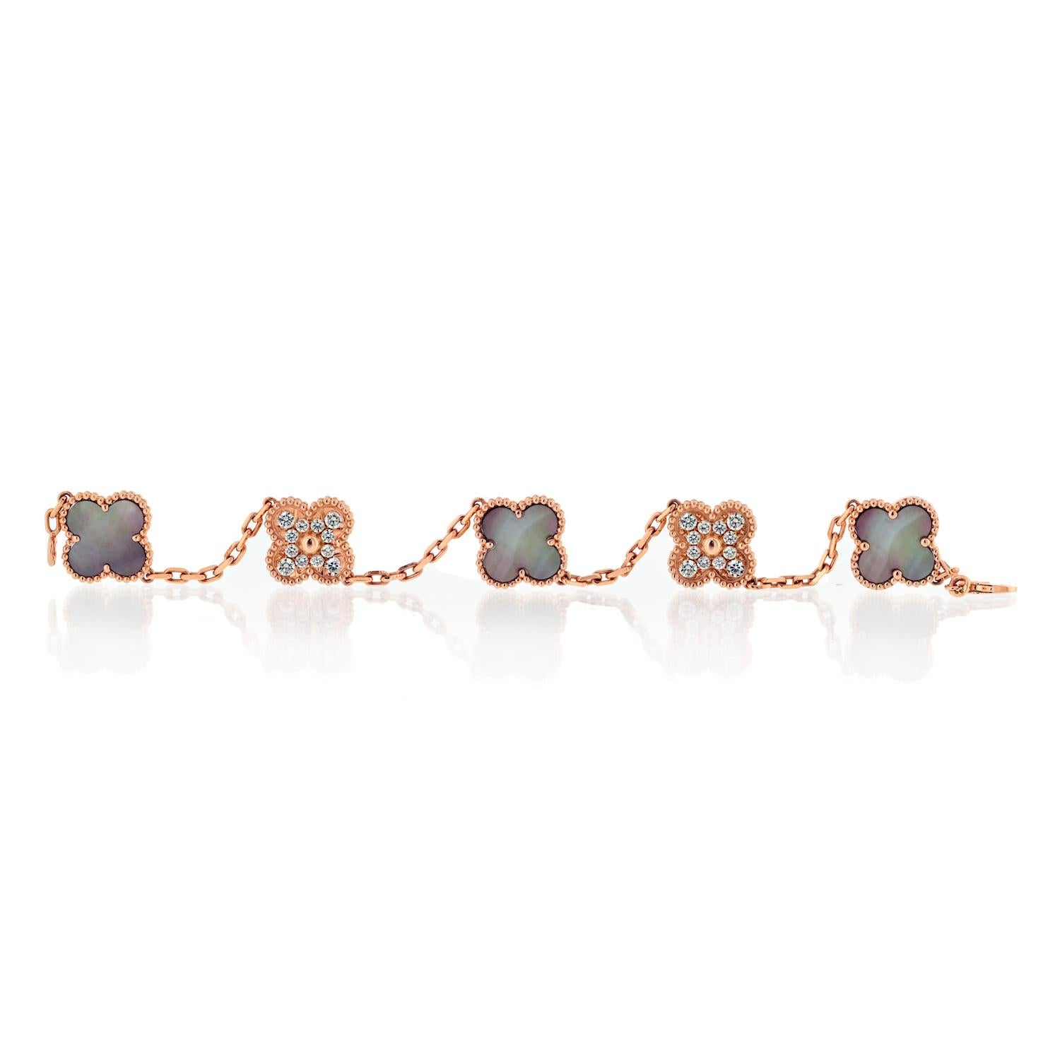 Van Cleef & Arpels 18KR Gold 5 Motif Grey Mother Of Pearl And Diamond Bracelet.

With original box and VCA certificate. 

Crafted meticulously with 18K rose gold, this exquisite bracelet features five meticulously crafted motifs adorned with the