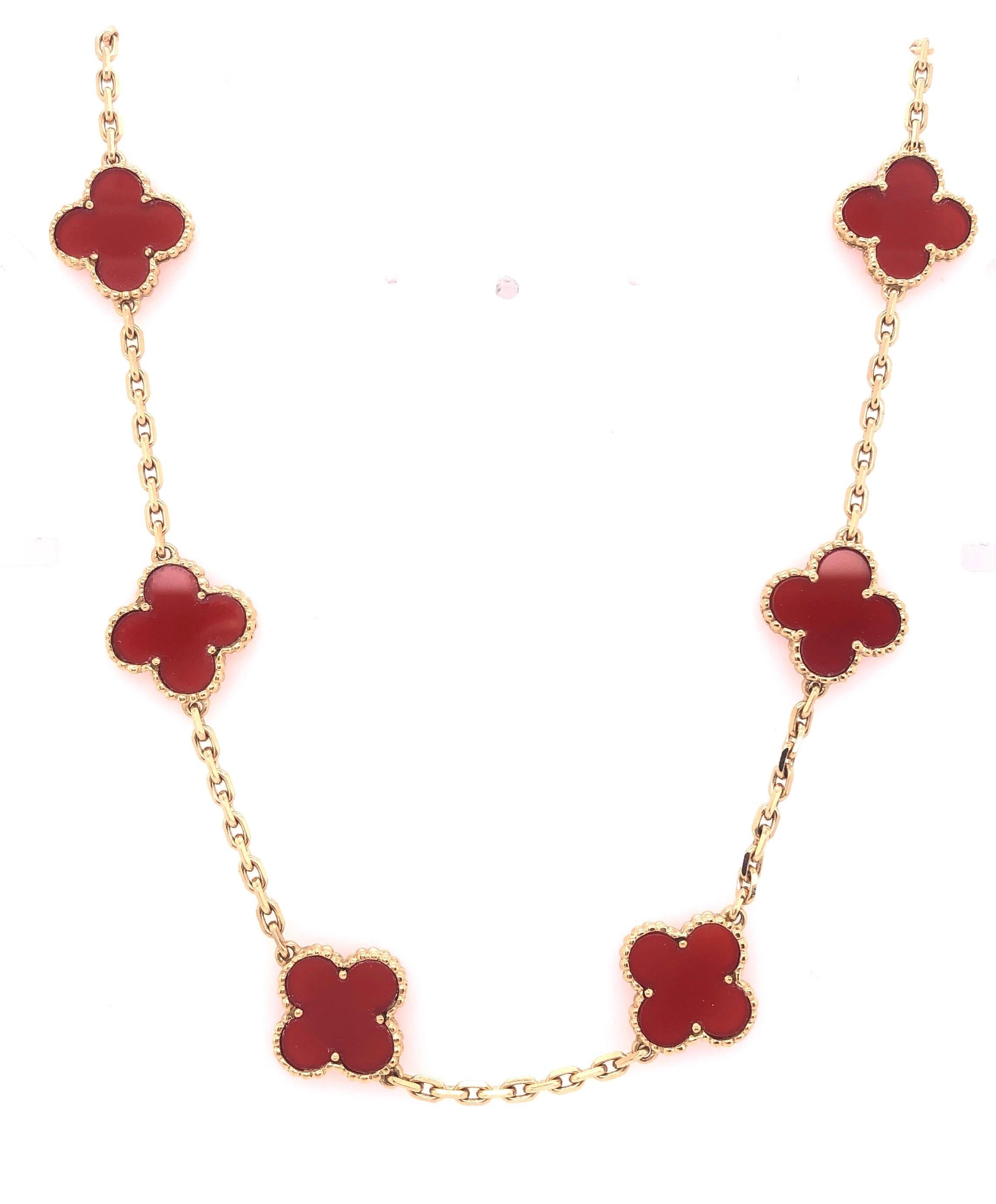 18Kt Yellow Gold Van Cleef & Arpels Vintage Alhambra Carnelian 10 Motif Necklace. Bearing VCA 750 with Serial BL143959 16.5 inch Chain. This necklace is in magnificent condition and has been near never worn. 
