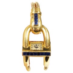 Van Cleef & Arpels 1940s Cadenas Montre-bracelet pour femme en or et saphir