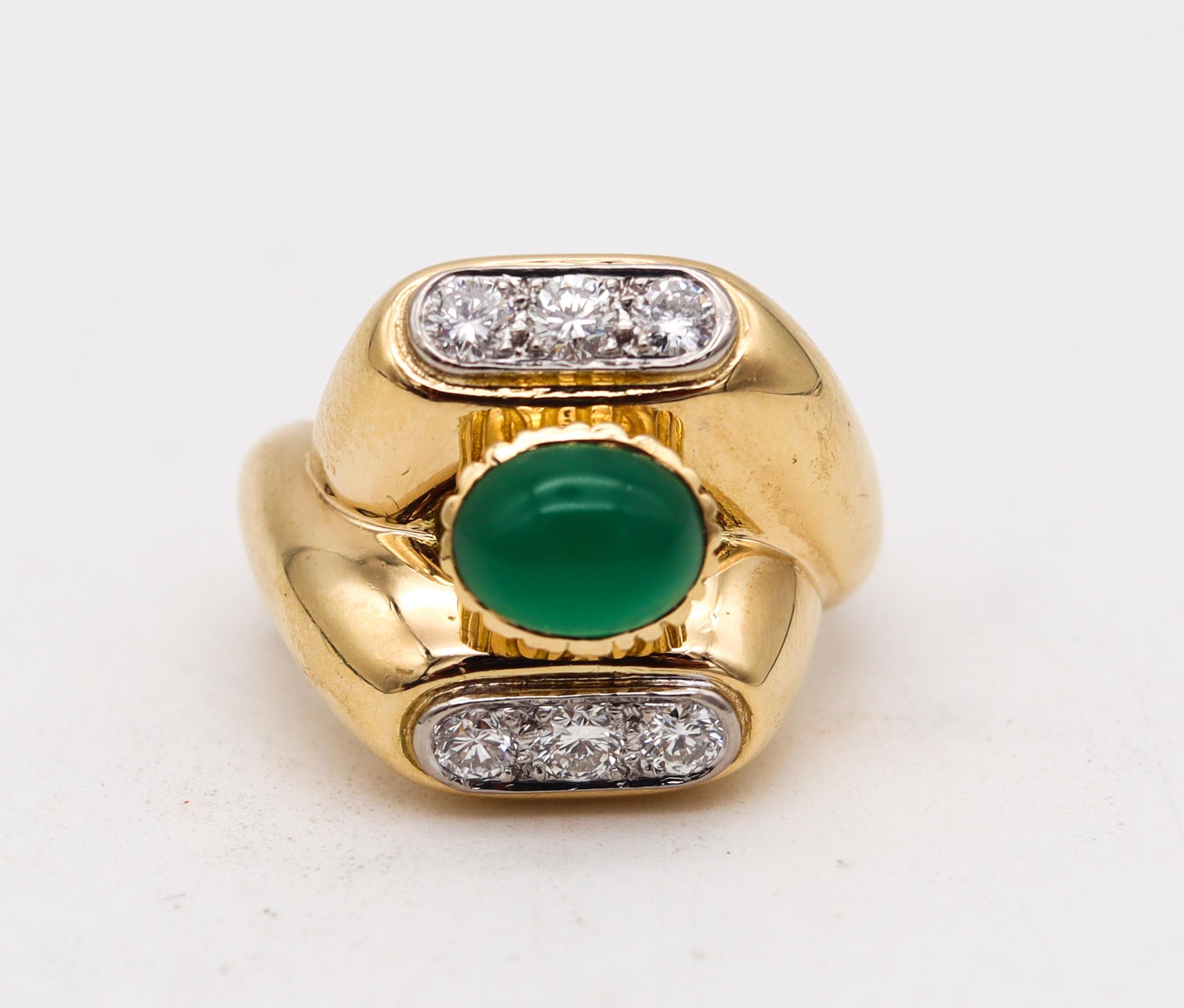 Gem set cocktail ring designed by Van Cleef & Arpels.

An unusual retro cocktail ring, created in Paris France by the jewelry house of Van Cleef & Arpels, back in the 1960. This bold ring is very rare and have been crafted with a crossover geometric