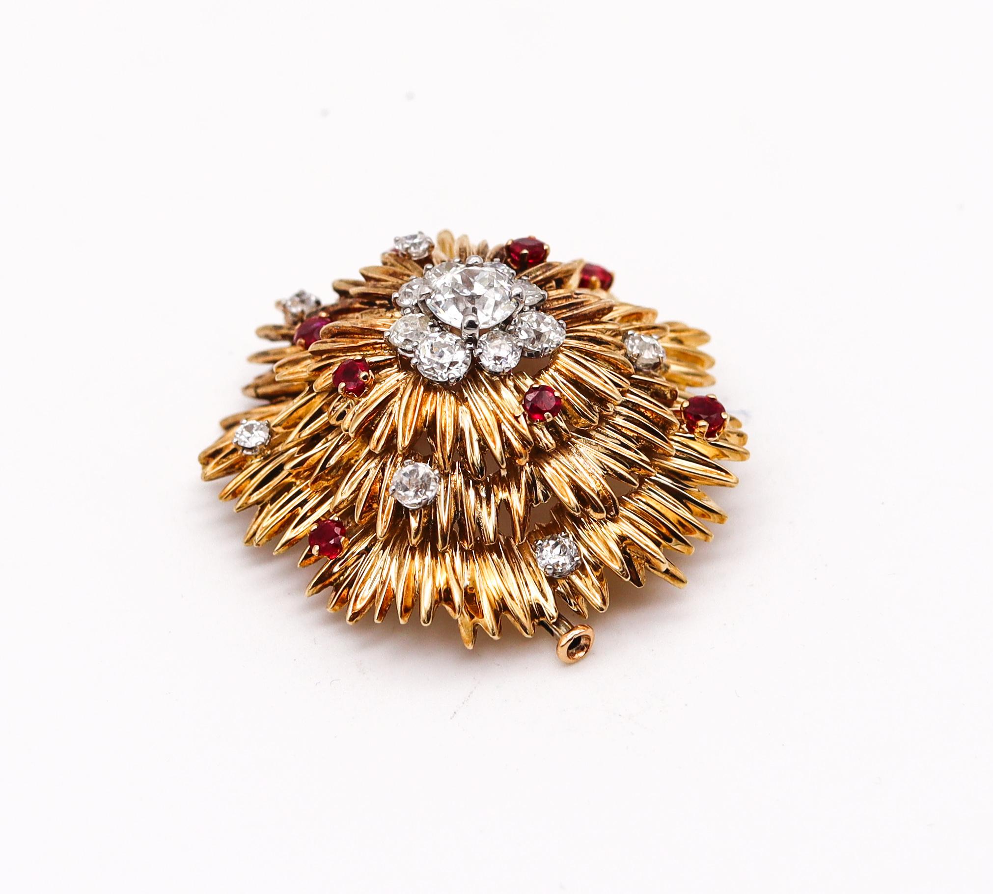Brooch designed by Van Cleef & Arpels.

Very beautiful piece, created in Paris France by the jewelry house of  Van Cleef & Arpels, back in the 1960. This brooch has been crafted in three dimensions with textured patterns made up of solid yellow gold