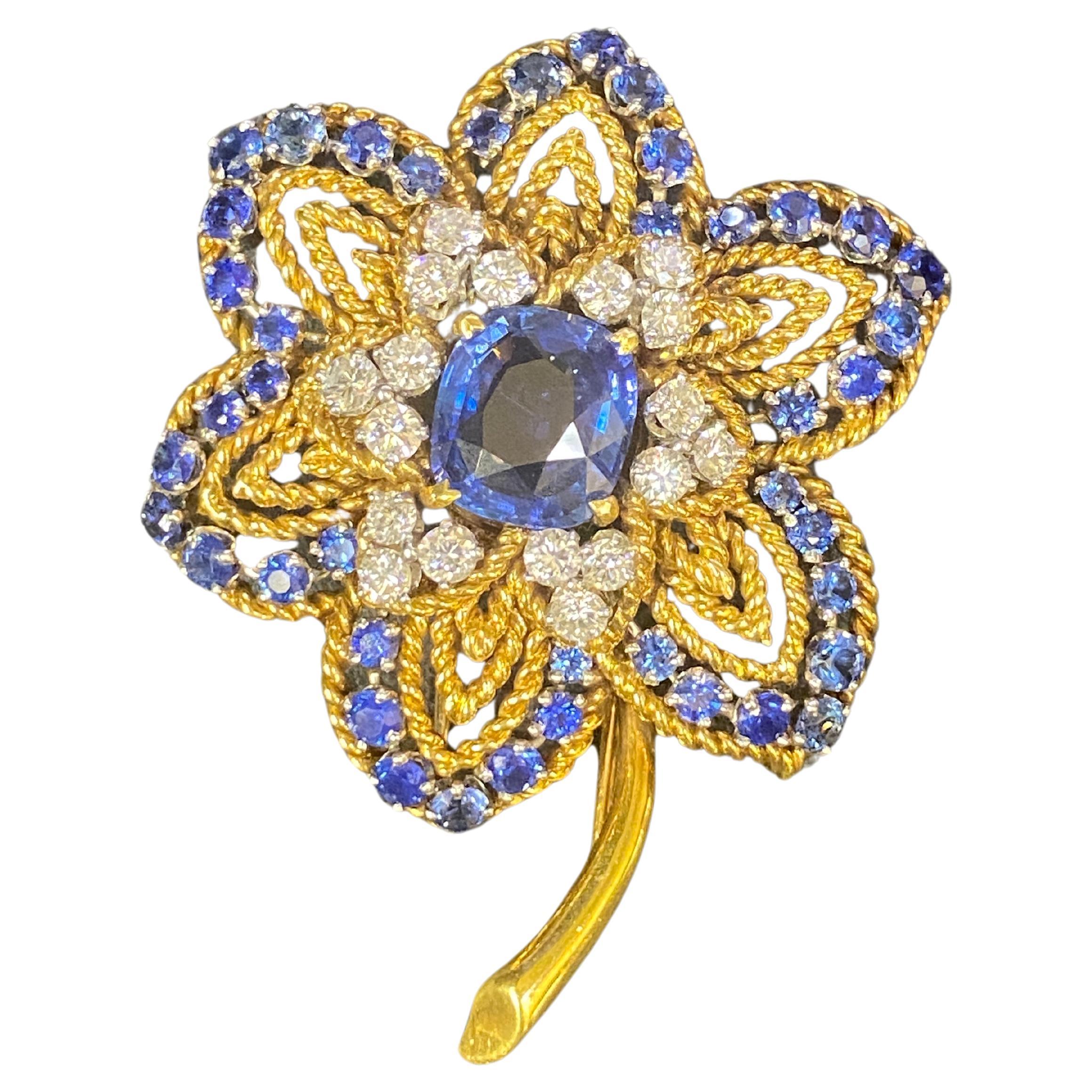 Van Cleef & Arpels 1960er Jahre Blumenbrosche aus 18 Karat Gold mit Saphiren und Diamanten