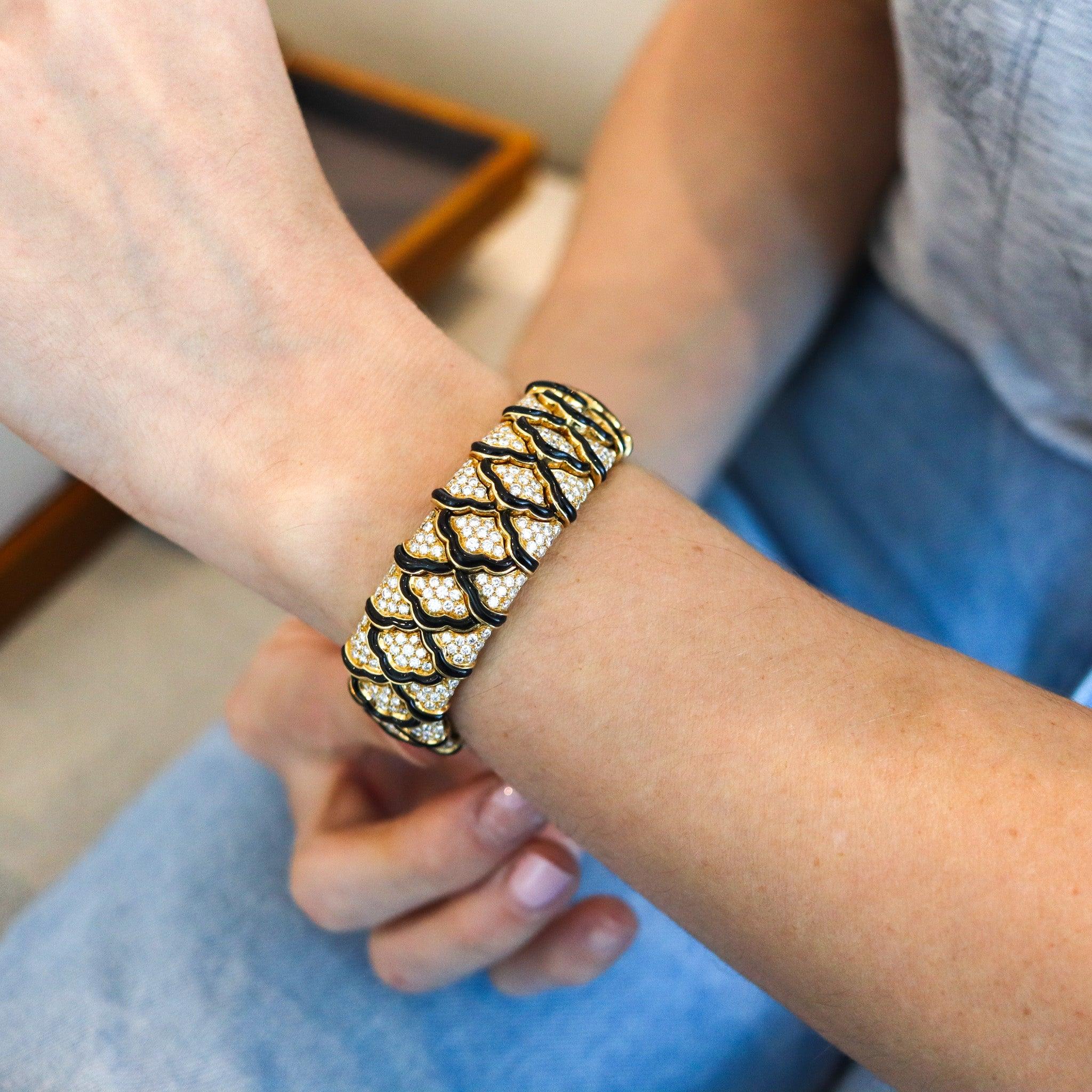 Bracelet designed by Van Cleef & Arpels.

This is a fantastic bracelet, created in Paris France by the iconic jewelry house of Van Cleef & Arpels, back in the late 1970. The exceptional bracelet is composed by eighteen articulated links crafted in