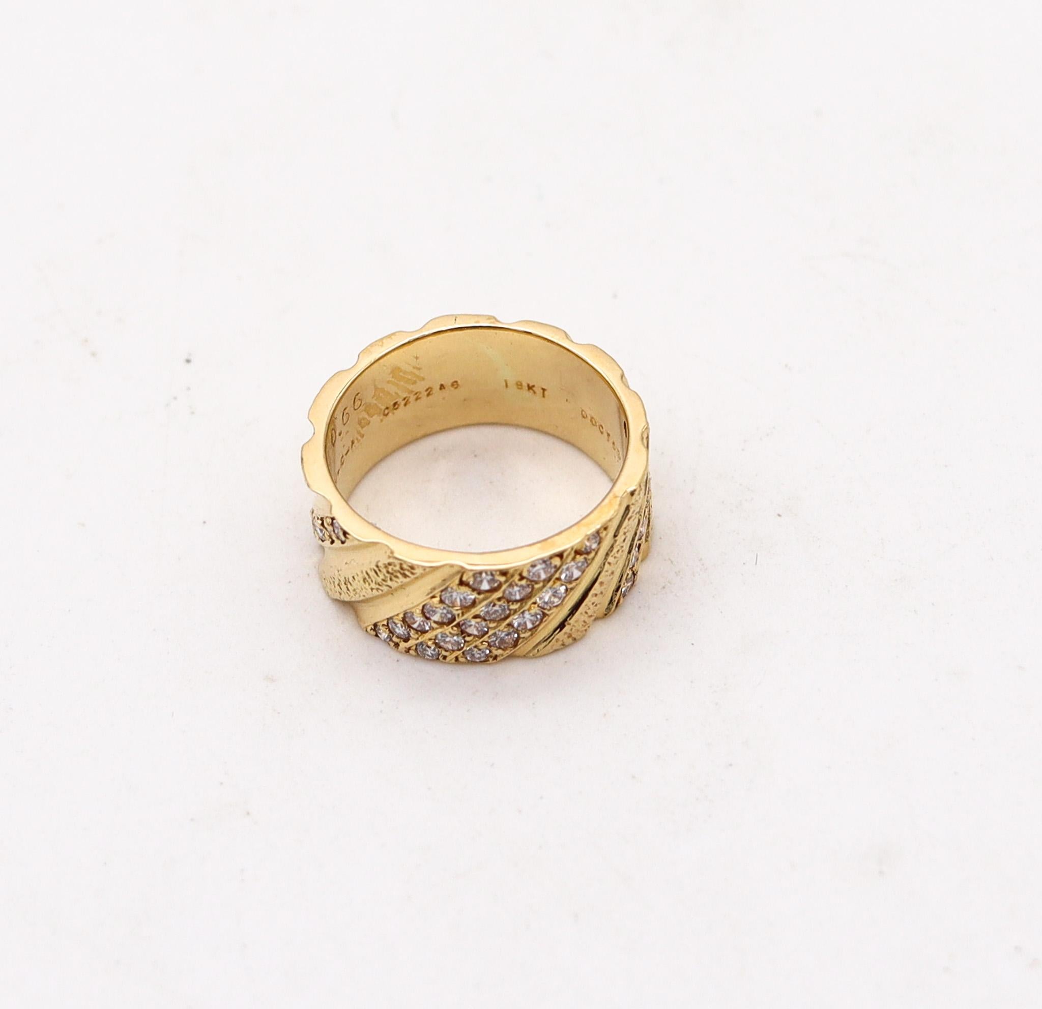 Ring band designed by Van Cleef & Arpels.

Beautiful contemporary ring, created in Paris France by the jewelry house of Van Cleef & Arpels. This beautiful ring has been carefully crafted in solid yellow gold of 18 karats with high textured and