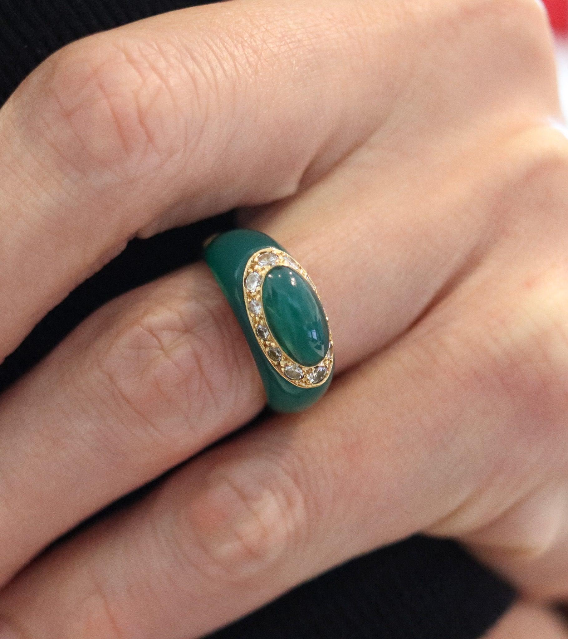 Bombe ring designed by Van Cleef & Arpels.

This is a vintage bombe ring created in Paris France, circa 1970's. It was crafted by the house of Van Cleef & Arpels in solid yellow gold of 18 karats with high polished finish and embellished with two