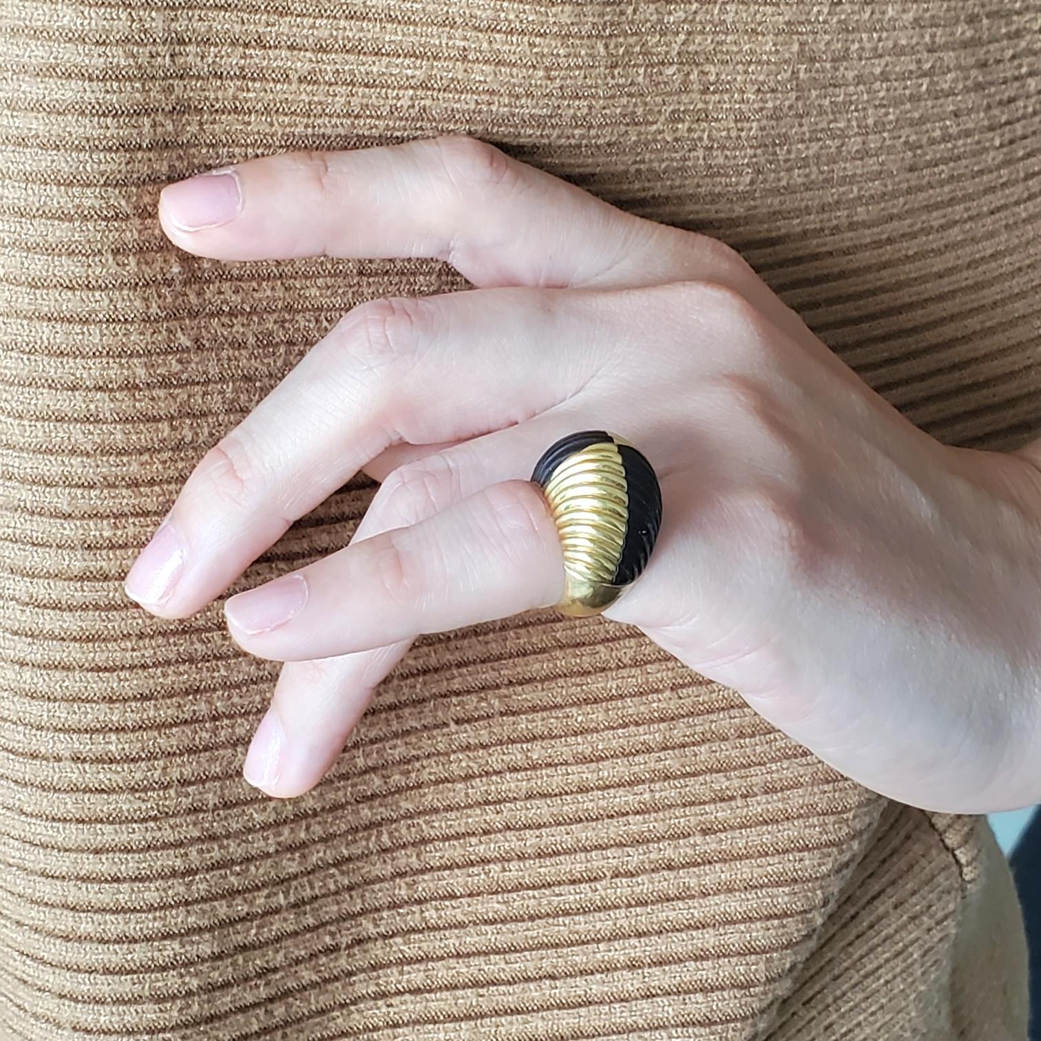 Bombe cocktail ring designed by Van Cleef & Arpels.

A vintage modernist ring, created in Paris France by the jewelry house of Van Cleef & Arpels, back in the 1970. This rare ring was carefully assembled and crafted in solid yellow gold of 18 karats