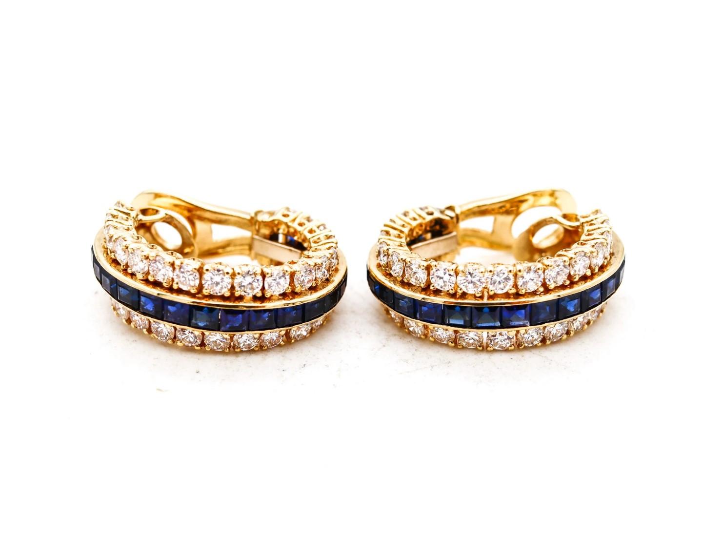 Pair of a gem set clips-earrings designed by Van Cleef & Arpels.

Gorgeous pieces, created in France, by the iconic Parisian jewelry house of Van Cleef & Arpels. This pair of clips-earrings was crafted in solid yellow gold of 18 karats, with French