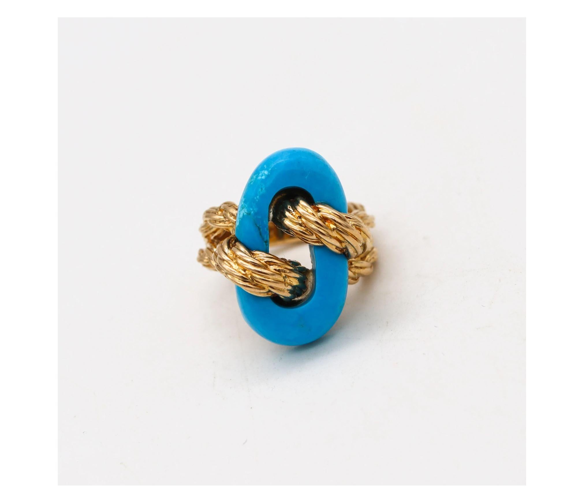 A cocktail ring designed by Van Cleef & Arpels.

Beautiful and colorful vintage piece made in Paris France by the iconic jewelry house of Van Cleef & Arpels, back in the 1970. This nice and rare ring has been crafted with twisted ropes patterns in