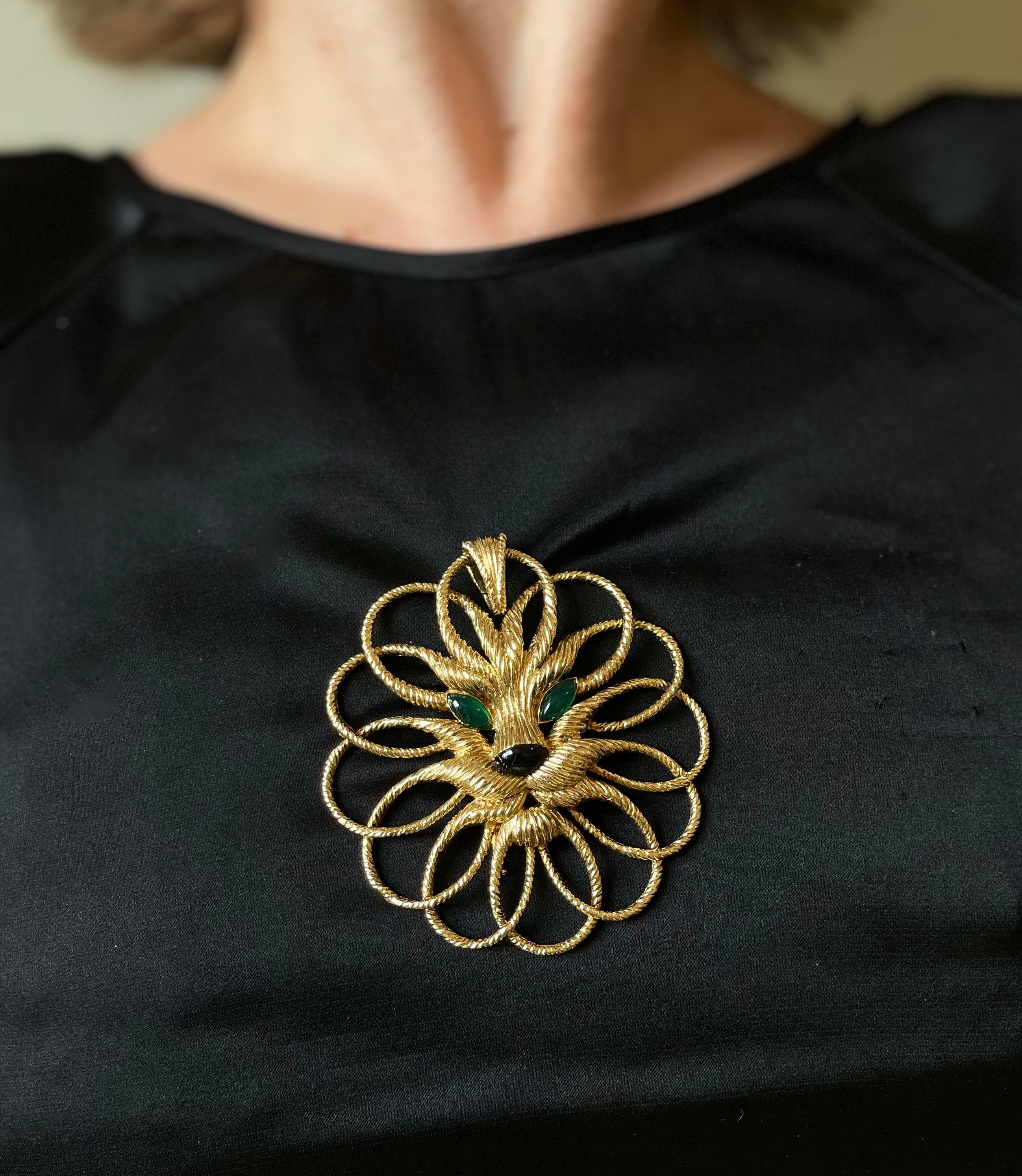 Large and substantial 18k gold Lion pendant, circa 1970s , crafted by Van Cleef & Arpels, set with onyx nose and marquise cut chrysoprase eyes. Pendant can be worn as a brooch,  measures 3.25