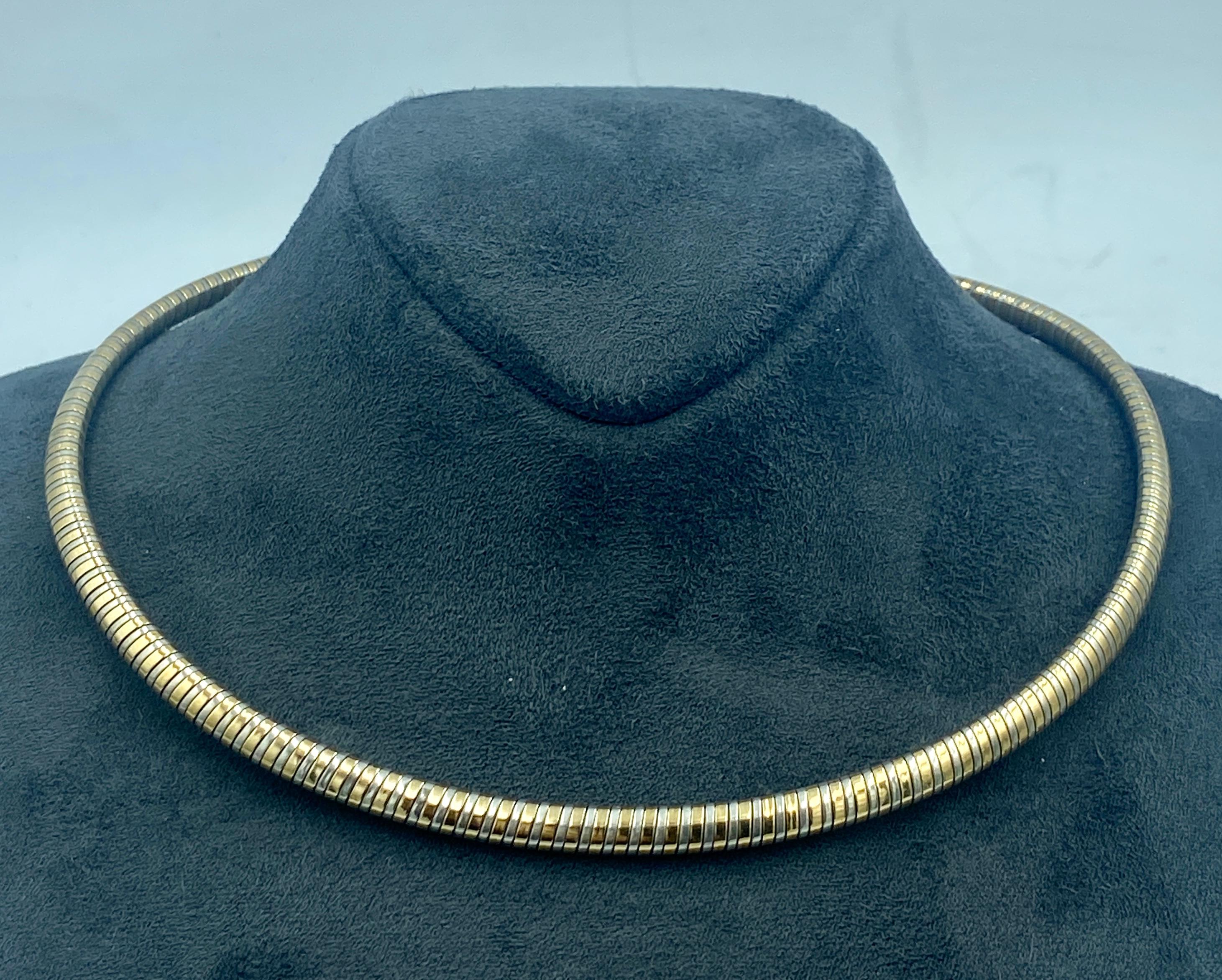 This 1970s Van Cleef & Arpels choker is made of silver and 18k gold and is very flexible. It carries the French assay marks and workshop marks for Lasbleiz, Fournier, Vitielo.