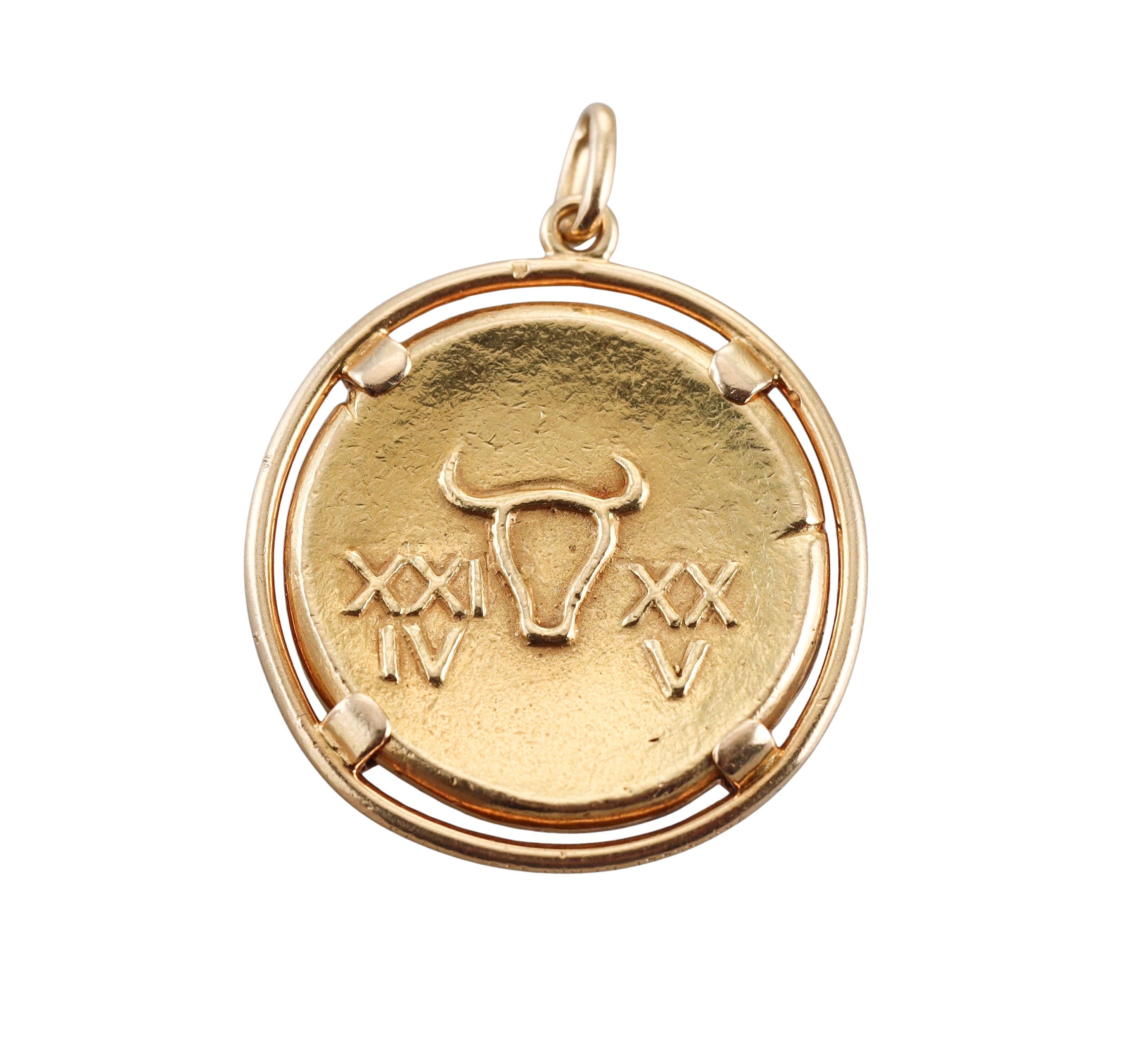 1970s vintage 18k yellow gold medallion, by Van Cleef & Arpels, depicting Taurus Zodiac sign. 
Pendant measures 1 3/16