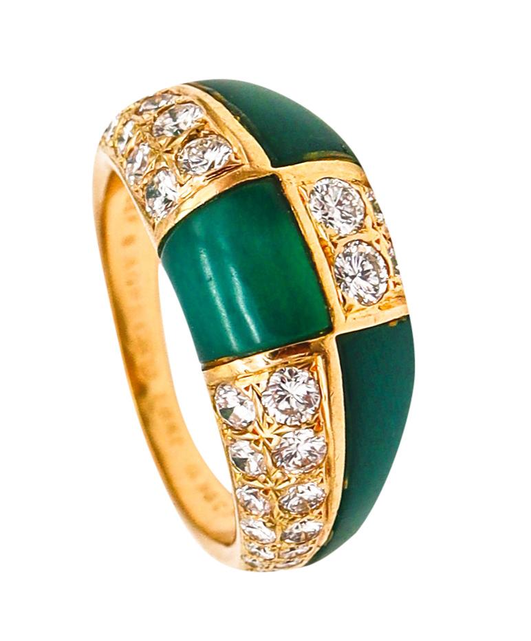Gem set chrysoprase ring designed by Van Cleef & Arpels.

Beautiful vintage ring band, made in Paris France by the jewelry house of Van Cleef & Arpels, back in the 1973. This geometric ring has been crafted with checkerboard patterns in solid yellow