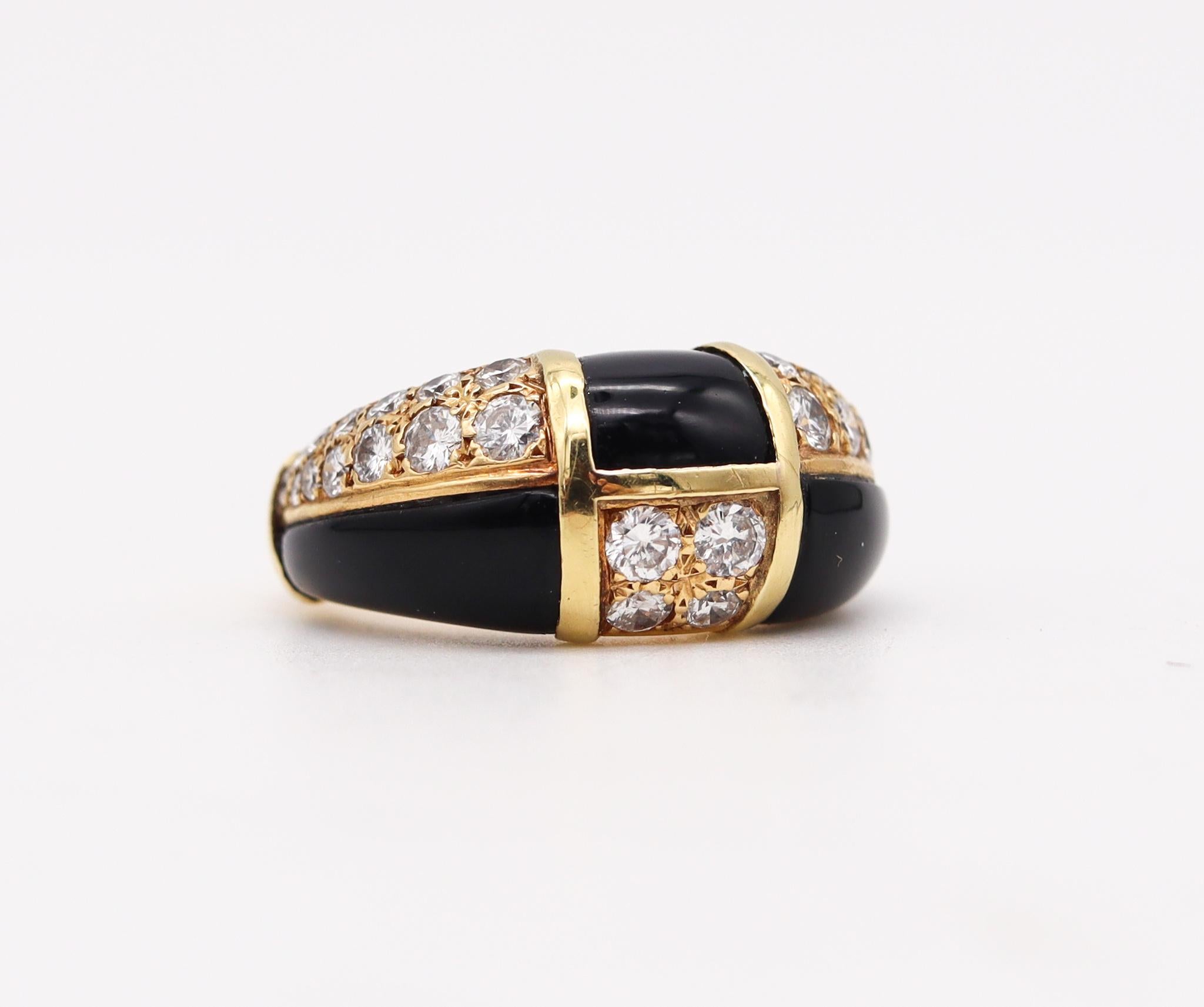 Gem set onyx ring designed by Van Cleef & Arpels.

Beautiful vintage ring band, made in Paris France by the jewelry house of Van Cleef & Arpels, back in the 1973. This geometric ring has been crafted with checkerboard patterns in solid yellow gold