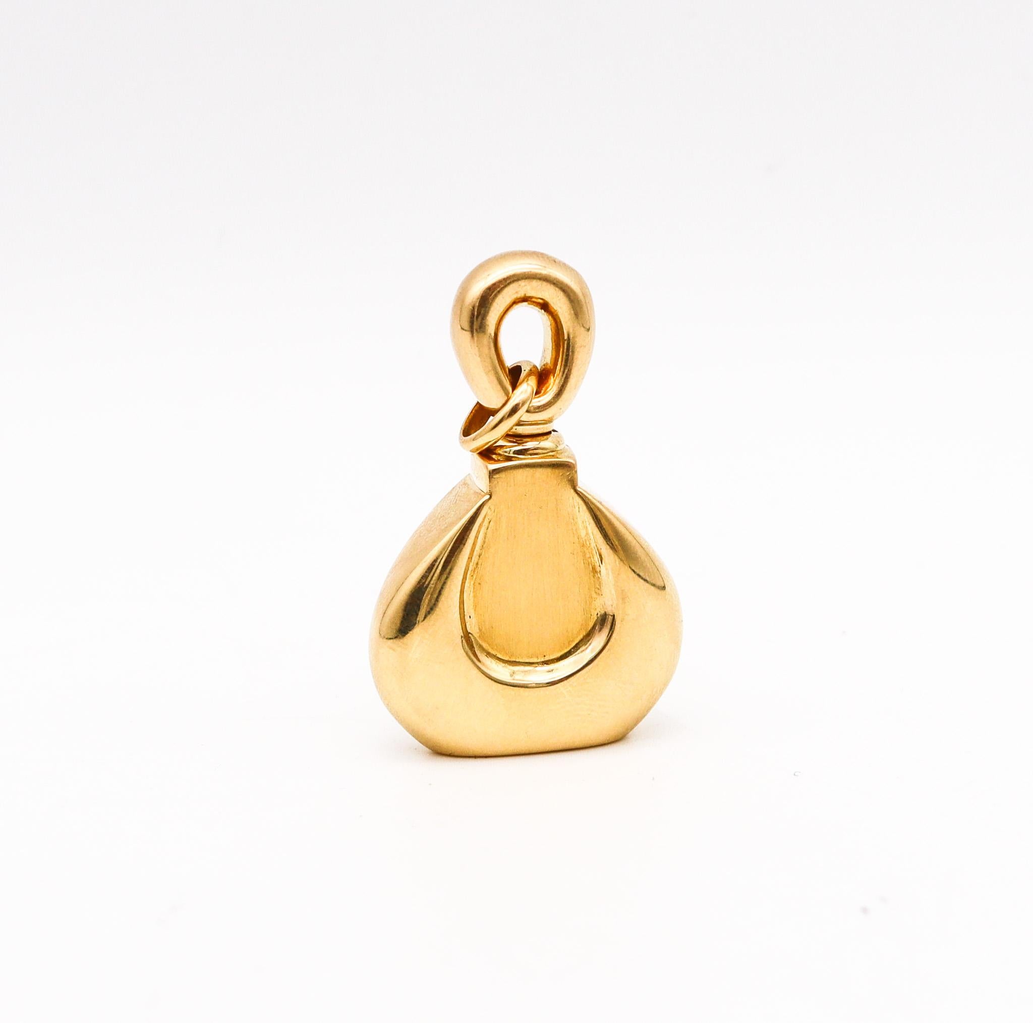 A perfume bottle pendant designed by Van Cleef & Arpels.

Very rare perfume bottle pendant, created in Paris France by the jewelry house of Van Cleef & Arpels, back in the 1976. This piece is very unusual and never see in the collector's after