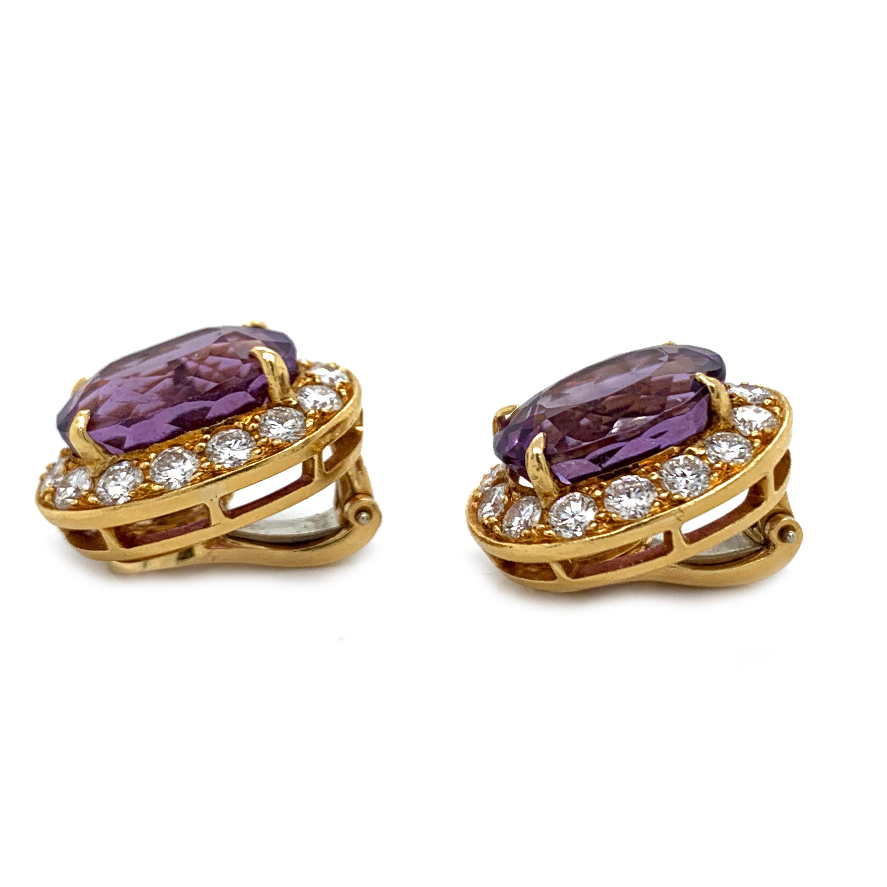 A stunning pair of 1980's Vancleef & Arpels amethyst and diamond earrings are in excellent condition, with all proper hallmarks, stamped 