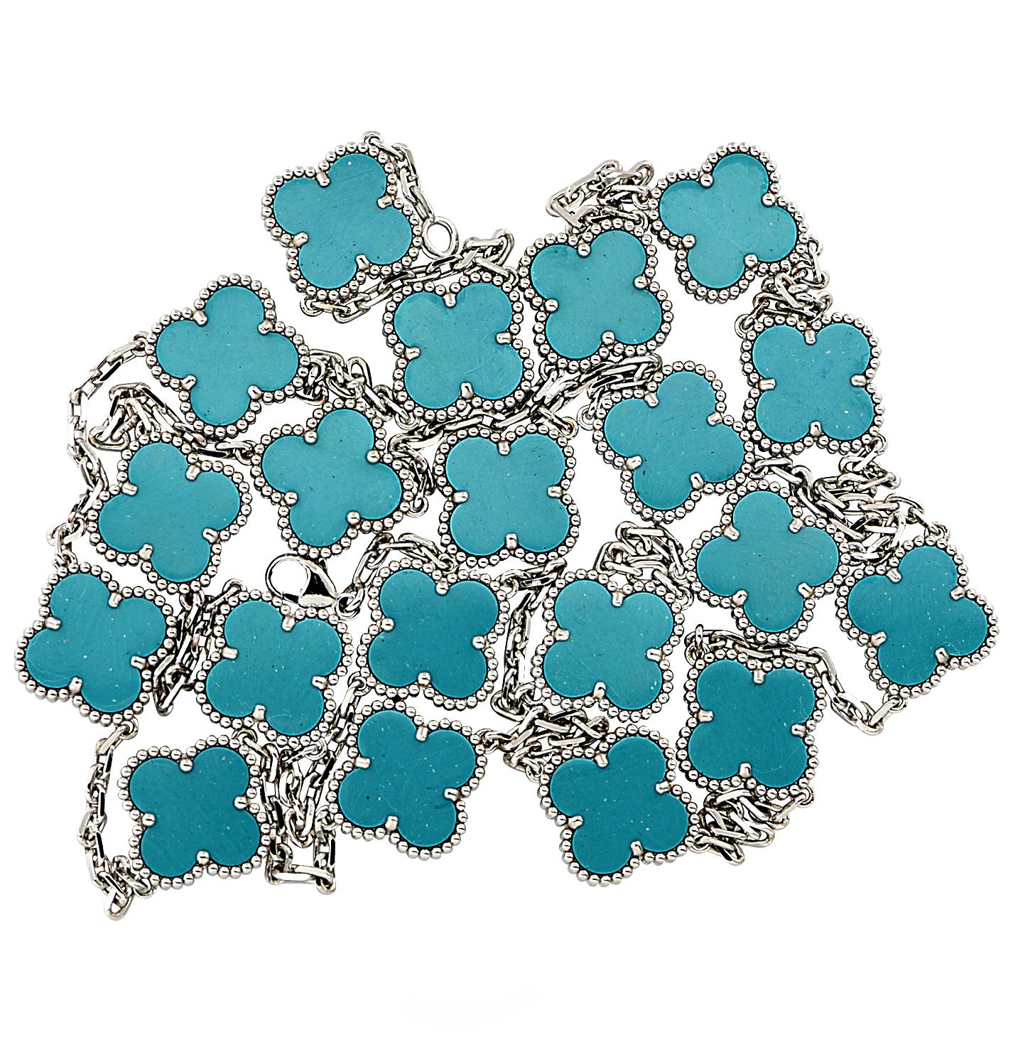 From the House of Van Cleef & Arpels, this exquisite Alhambra necklace, circa 2008, is finely handmade in 18 Karat white gold. Twenty motifs inspired by the clover and embellished with turquoise, are interspersed on a white gold chain measuring 33