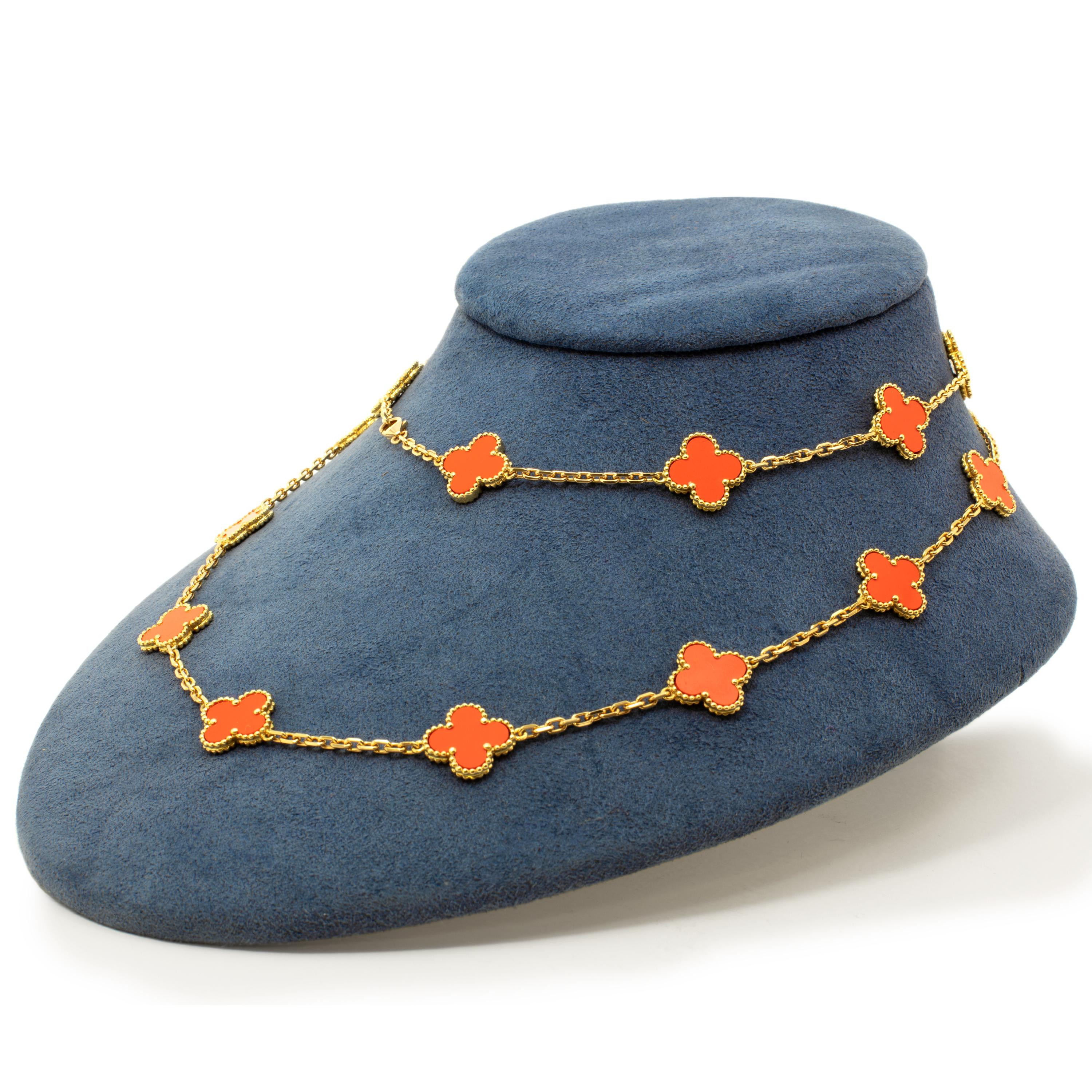 We are proud to offer a rare and highly desirable Vintage Alhambra necklace by Van Cleef & Arpels, in 18k yellow gold set with twenty rich and gorgeously vibrant coral stations. 34