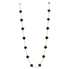 Van Cleef & Arpels Alhambra Lange Halskette aus 18 Karat Gelbgold mit Onyxmotiven