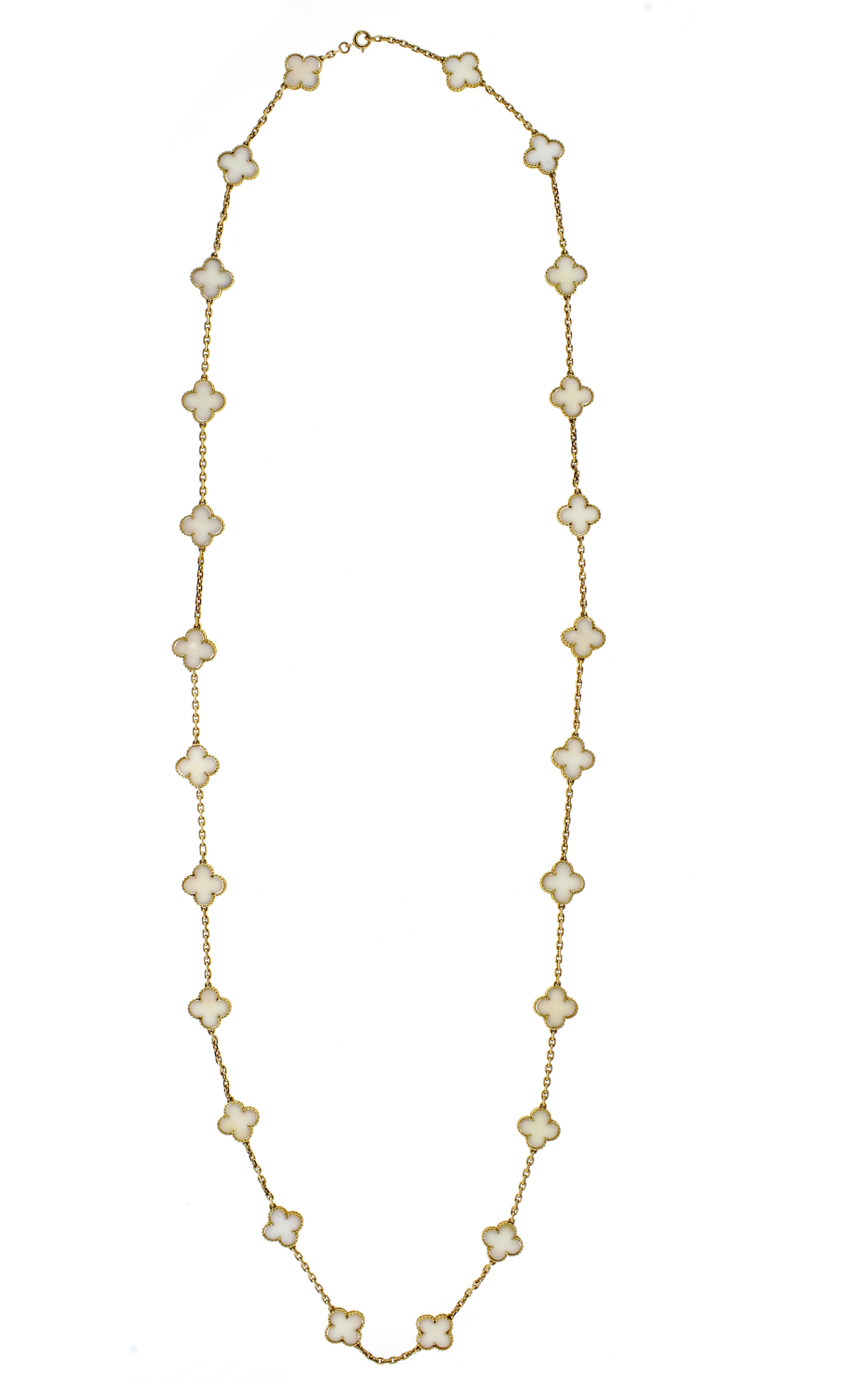 From Van cleef & Arpels, a 24 station white coral 18 karat gold Alhambra Necklace.  Part of the original  1968 collection this necklace was made for a VC&A associate with 24 stations. This allows the necklace to be easily 
 worn doubled.   40 inches