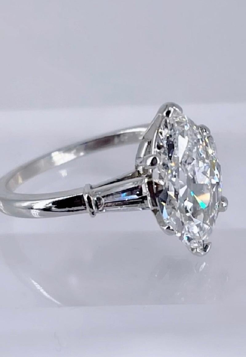 This exquisite Van Cleef & Arpels ring is a sparkling piece of history! Crafted in the 1940s/1950s, this gorgeous 2.81 carat antique cut marquise is a rare find. It has a charming pattern of large facets that give a unique brilliance, and the
