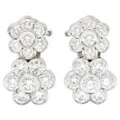 Van Cleef & Arpels Boucles d'oreilles à double fleur hawaïenne en platine et diamants de 3,50 carats