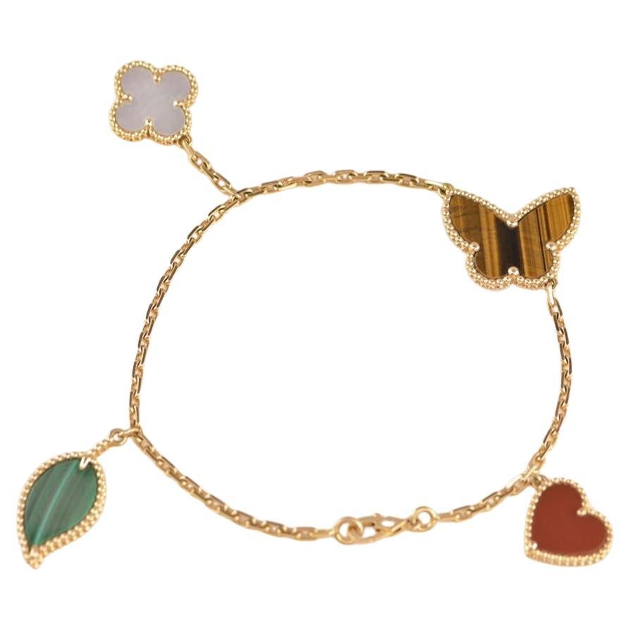 Van Cleef and Arpels 4 Motifs 18k Yellow Gold Lucky Alhambra Bracelet at  1stDibs