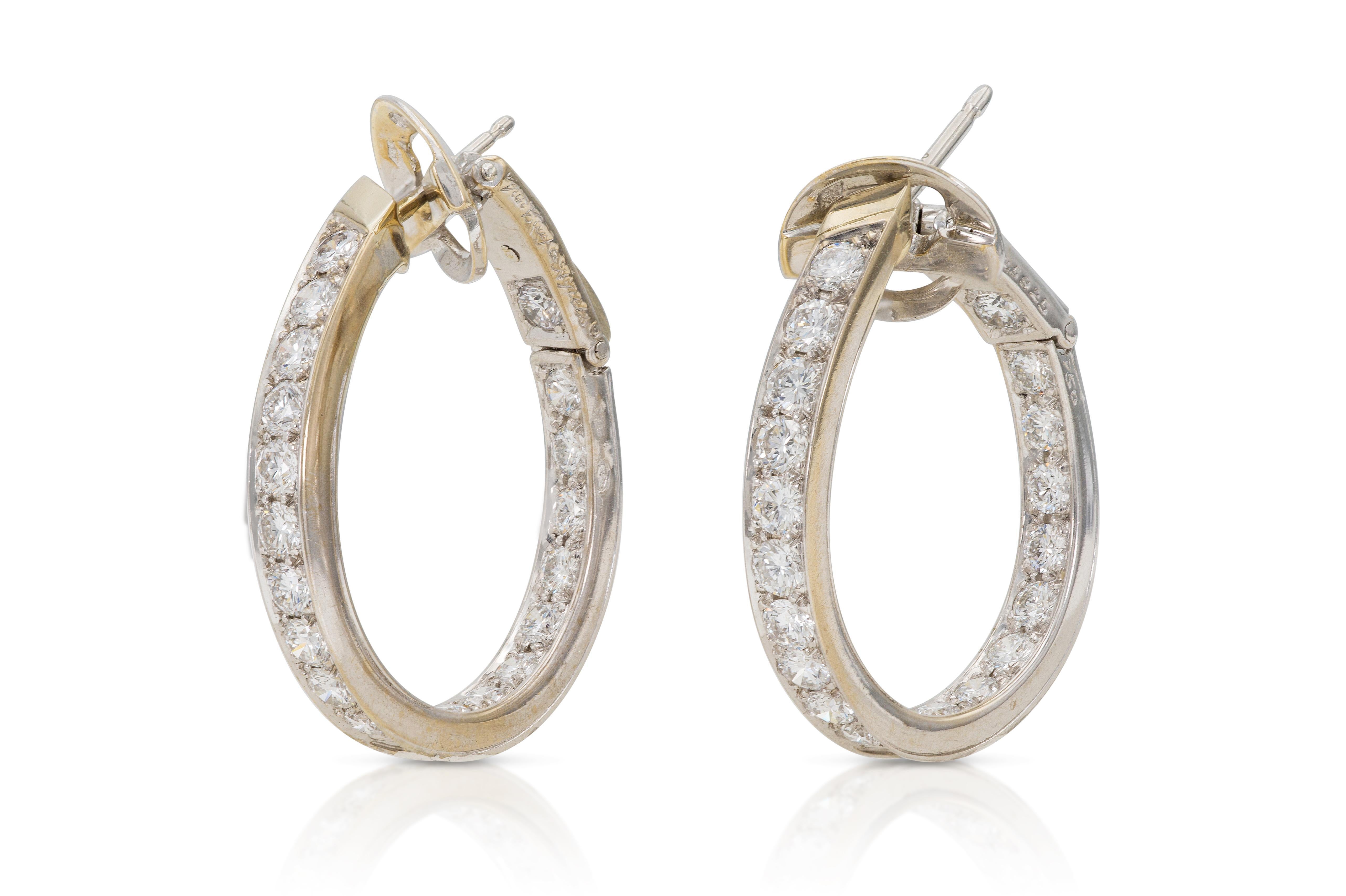 Finely crafted in 18k white gold with Round Brilliant cut Diamonds weighing approximately 4.00 carats.
Signed by Van Cleef & Arpels
1 x 7/8 inch x 3mm