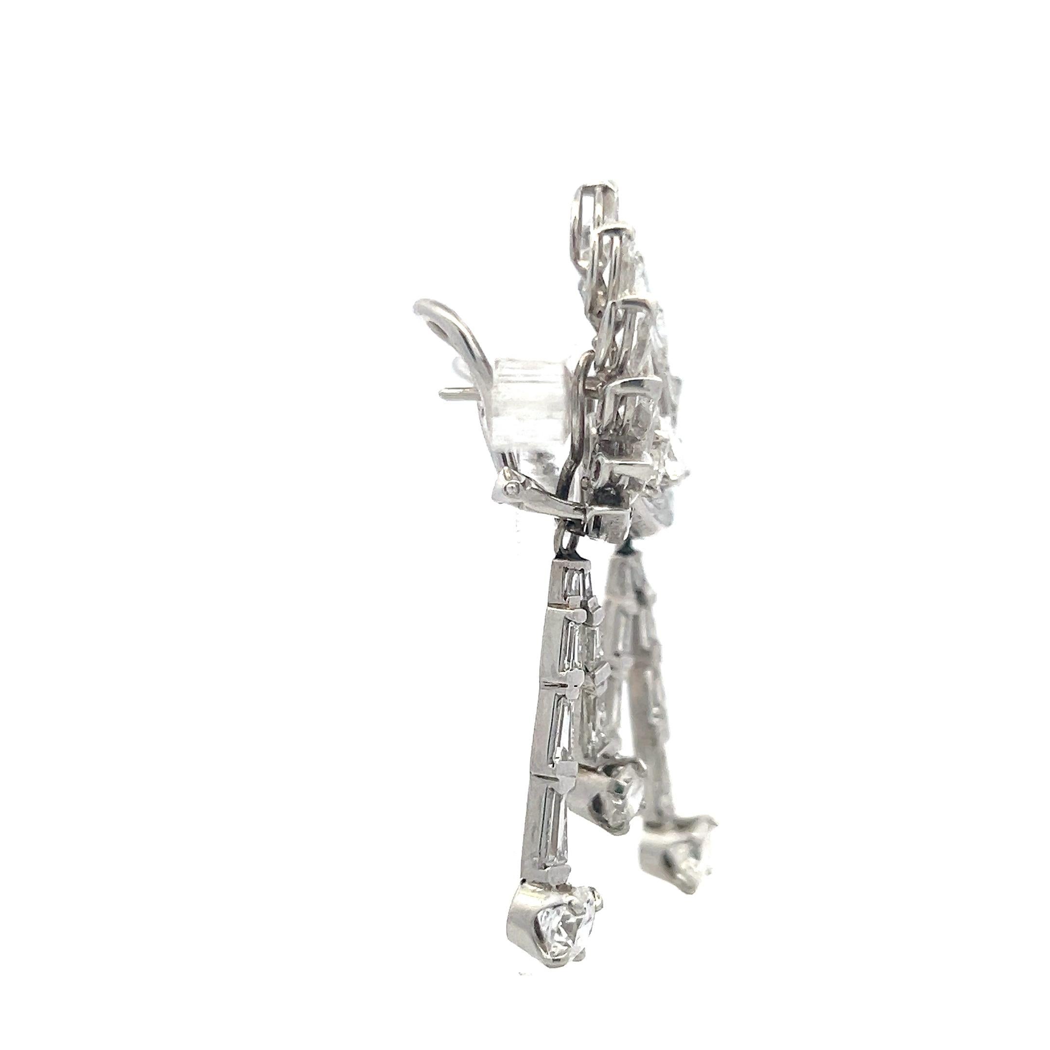Designer:
Van Cleef & Arpels
Title:
Van Cleef & Arpels 4.50 Carat G VS Diamond Platinum Dangling Earrings
Style:
Dangling
Metal:
Platinum
Gemstone 1:
4.5 Carat Diamond
Number of