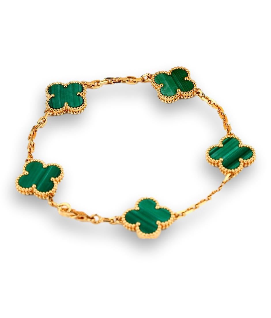 18k Yellow Gold 5-Motif Malachite Vintage Alhambra Bracelet by Van Cleef & Arpels. 
The pendant comes with a VCA original box and certificate of authenticity. 
Retail Price: £3750

Every piece we sell is 100% authentic guaranteed, in very good
