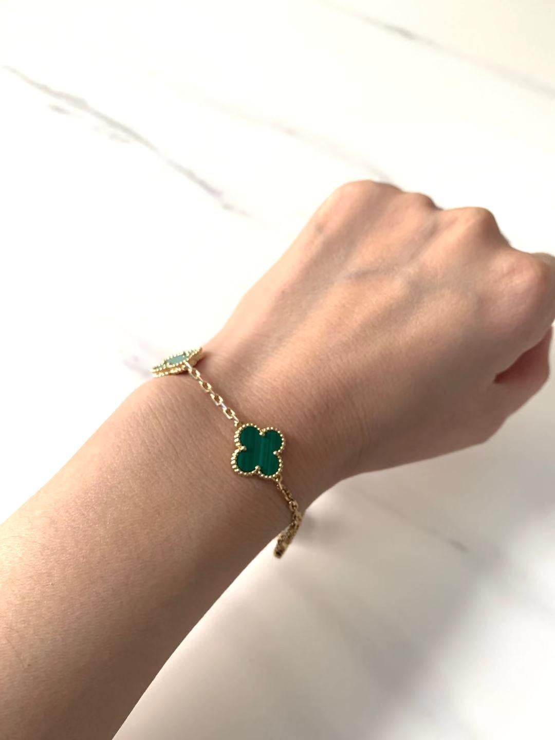 Van Cleef & Arpels 5 Motif Vintage Alhambra Malachite Gold Bracelet In Excellent Condition In Banbury, GB