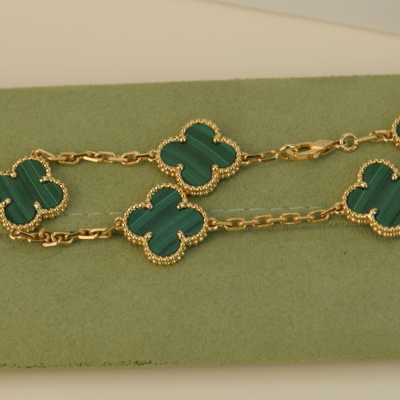 Van Cleef and Arpels 5 Motif Vintage Alhambra Malachite Yellow Gold Bracelet at 1stDibs van