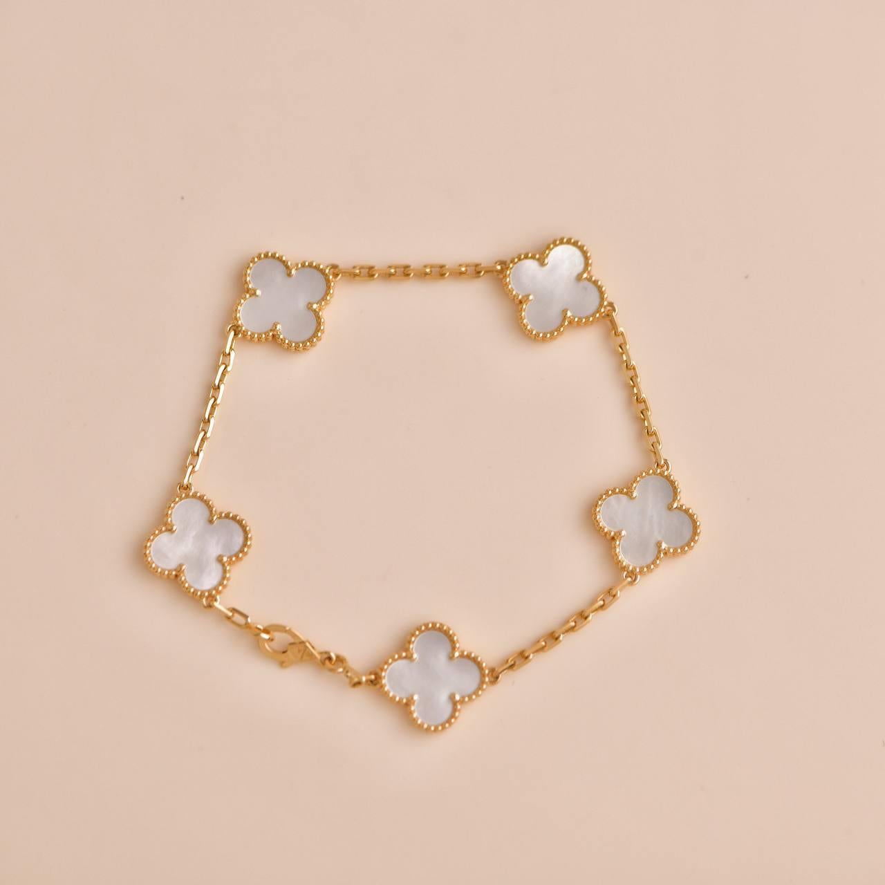 Women's or Men's Van Cleef & Arpels 5 Motif Vintage Alhambra Mother of Pearl Yellow Gold Bracelet