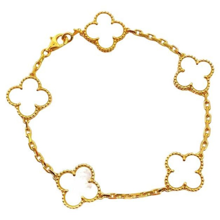 Van Cleef and Arpels Vintage Alhambra PerlmuttArmband mit 5 Motiven aus Gelbgold im Angebot bei