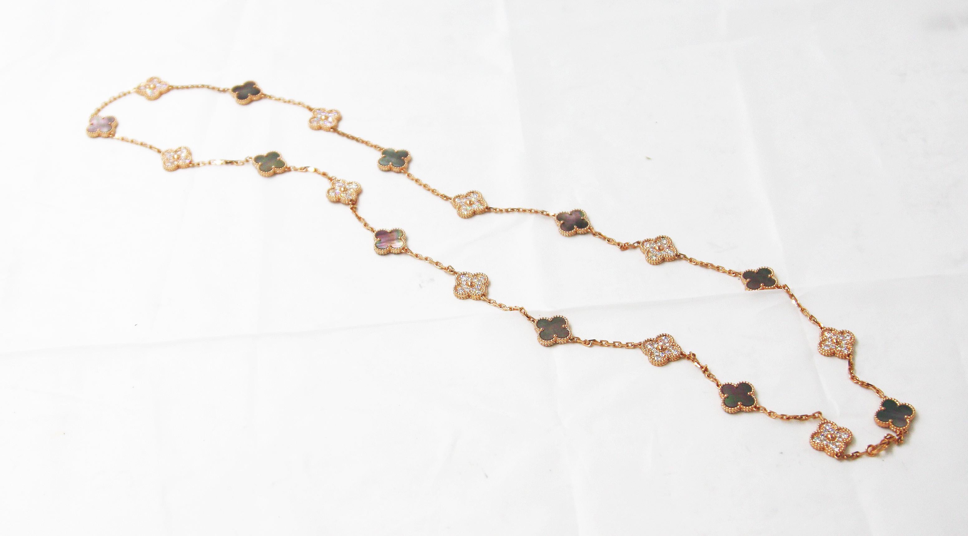 Vintage Alhambra long necklace, 20 motifs, pink gold, gray mother-of-pearl, round diamonds; diamond quality DEF, IF to VVS.
Diamond(s) : 120 stones, 4.83 carats
Mother of Pearl : 10 stones
Chain length : 33.6 inches
Come with Box and