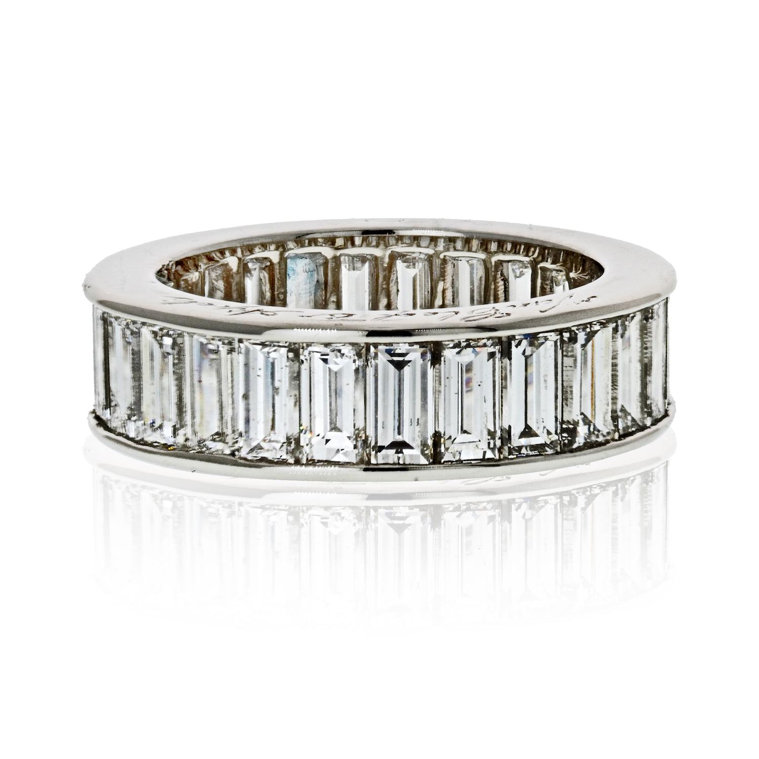 Welcome our newest addition to our eternity band collection. This baguette cut eternity band is filled with radiant stones that sparkle from every angle. This stunning band is in excellent condition and fits a finger size 5.5 and 5.75. Crafted in