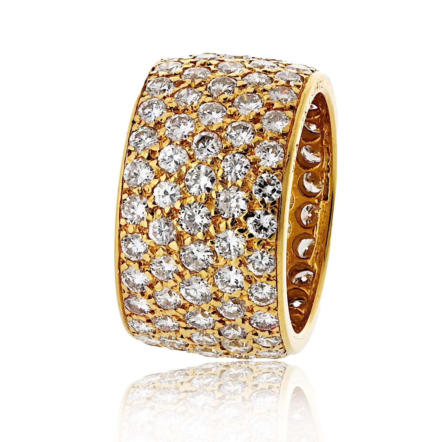 Van Cleef & Arpels 18K Yellow Gold 5-Row Pave Round Cut Diamond Ring. This stunning piece features a luxurious design with approximately 6.00 carats total weight of sparkling round-cut diamonds, set in a beautifully crafted 12mm wide band. 

Sized