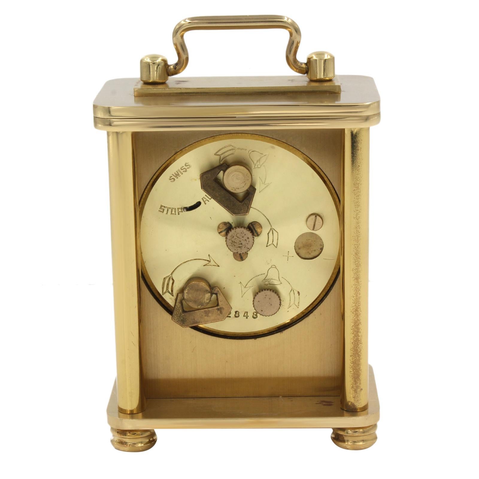 Van Cleef & Arpels 8 Days Vintage Brass Silver Dial Hand Wind Table Alarm Clock In Fair Condition In New York, NY