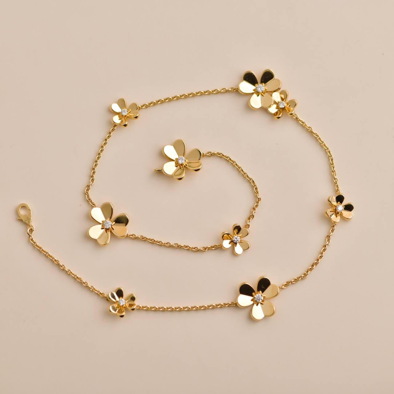Check out this beautiful Van Cleef & Arpels necklace from the stylish Frivole collection. It has 9 flowers made of 18k yellow gold, each adorned with 9 round brilliant-cut D-E-F color IF-VVS clarity diamonds, totaling about 0.61 carats. Crafted in
