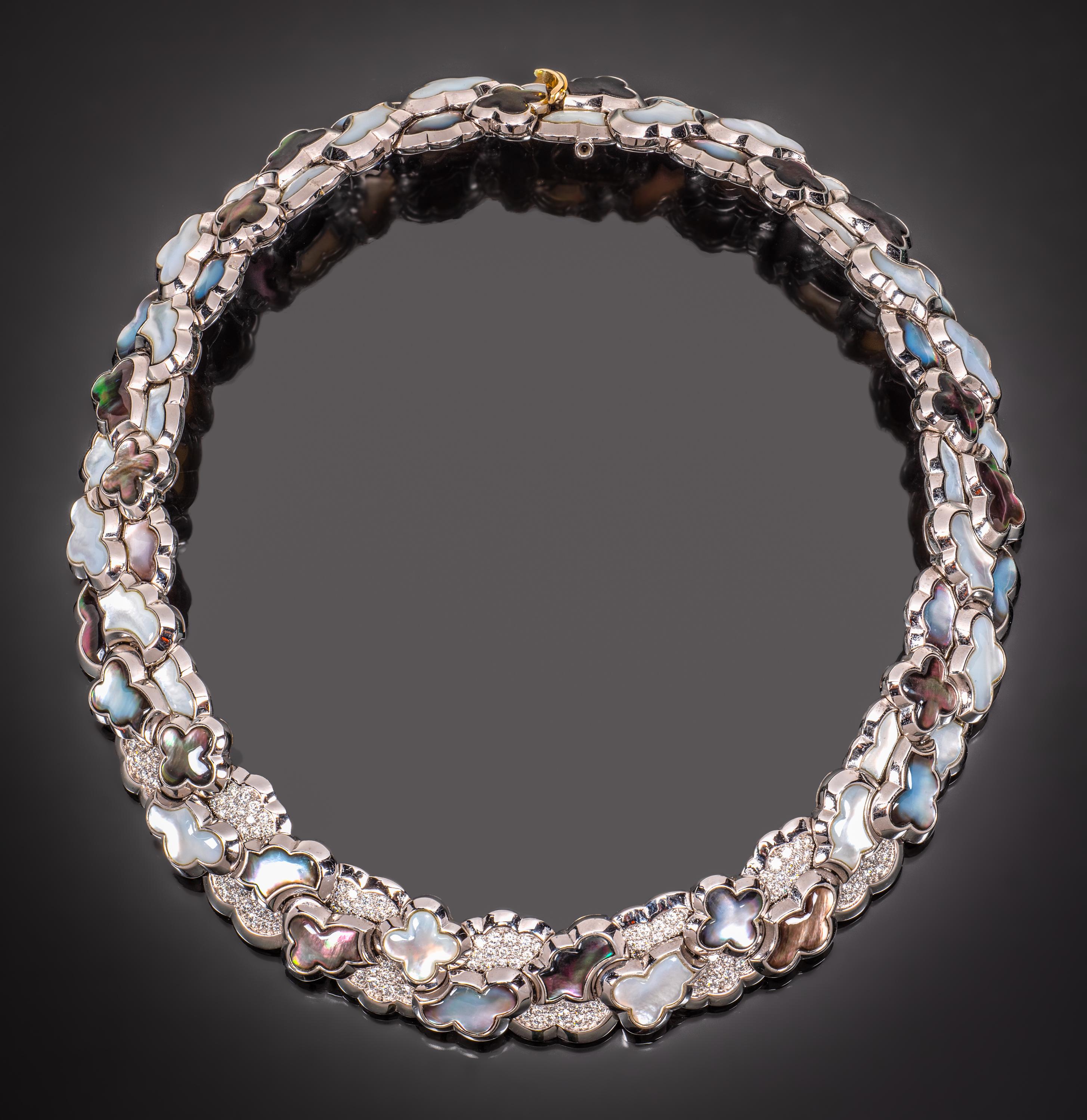 The Alhambra Collection was created in 1968 and is still one of Van Cleef & Arpels’ most popular designs. This rare vintage necklace, no longer in production, is composed of gray and white mother-of-pearl cloud-form links interspersed with the