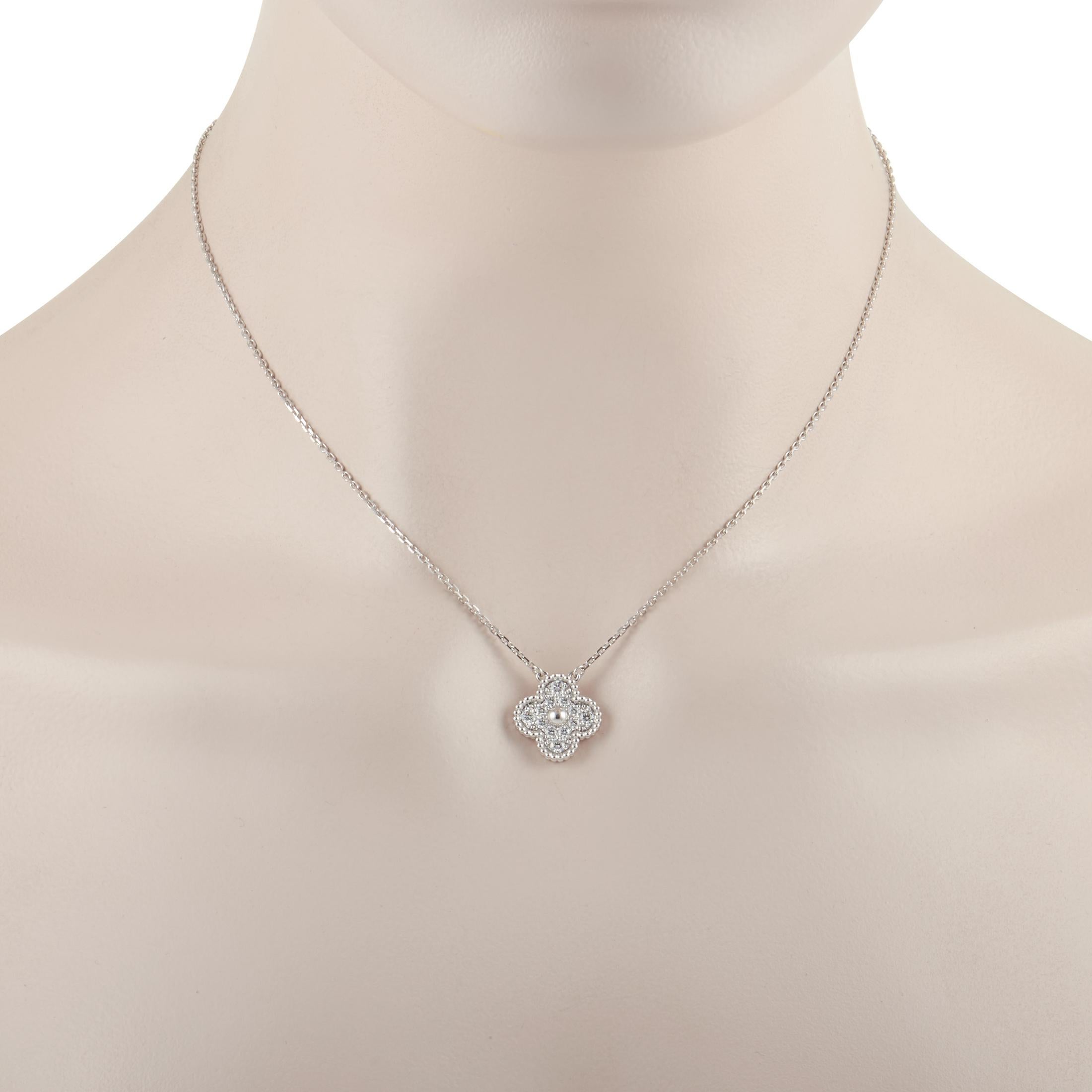 Luxury comes to life on this charming, dainty Alhambra Pendant Necklace from Van Cleef & Arpels. Glittering diamonds totaling 0.48 carats sparkle and shine from their place within the 18K White Gold setting, which is shaped like the high-end brand’s