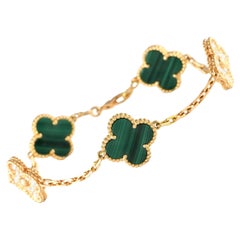Van Cleef & Arpels Alhambra: 18 Karat Gelbgold Alhambra 0,97 Karat Diamant und Malachit
